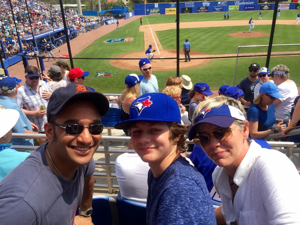  Ty, Muneesh and Monique enjoying a Blue Jays Spring Training game in Dunedin.&nbsp; 