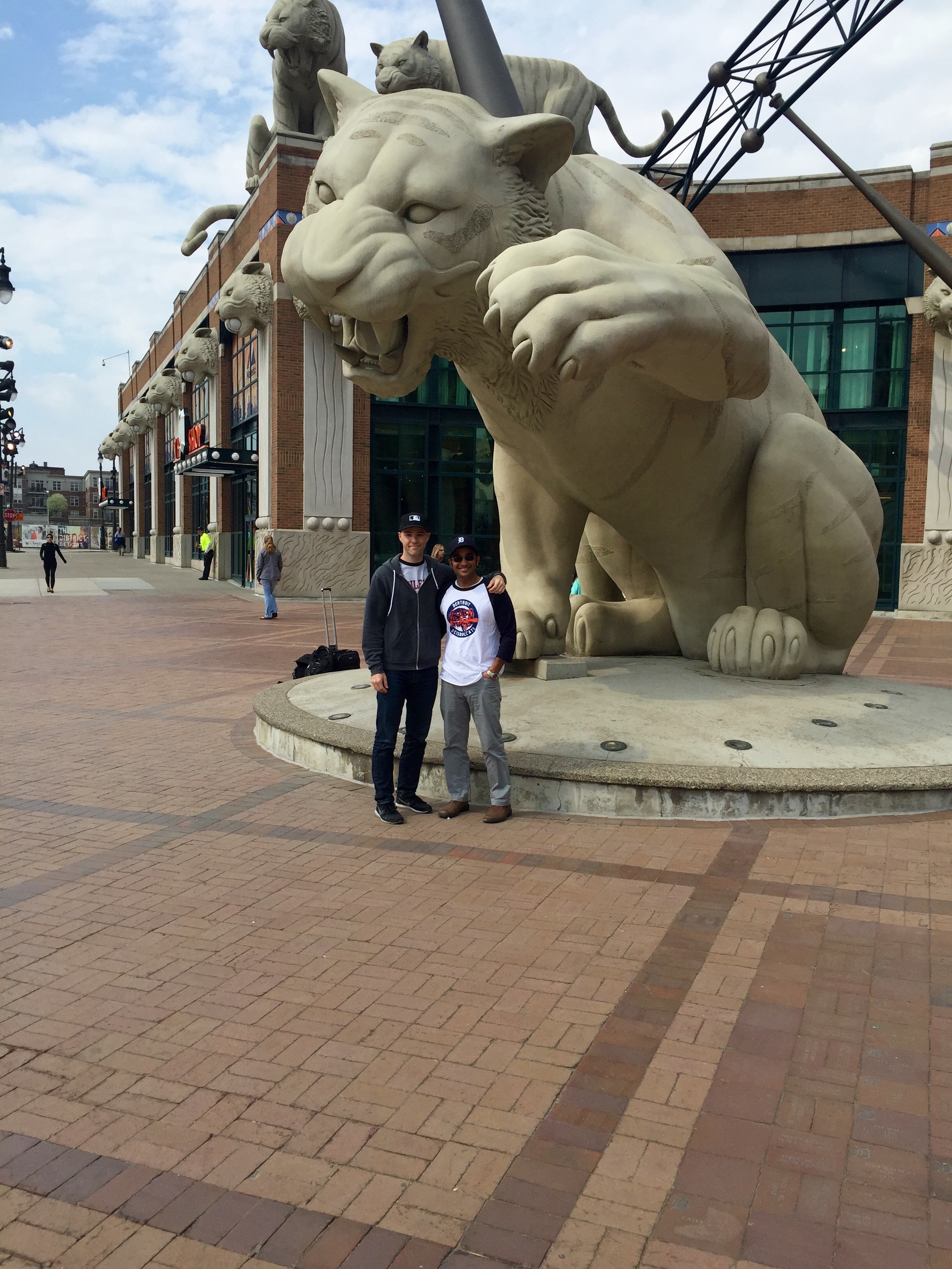 15_zack_and_muneesh_posing_with_the_big_cat.jpg