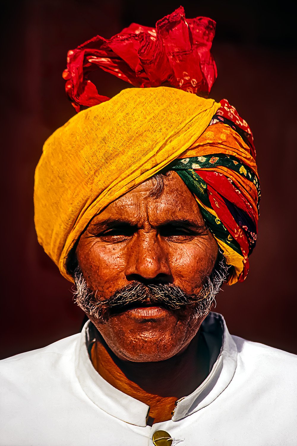 Sikh Man

 

  Asking strangers if I can take their photo is surprisingly easy...most say yes and seem genuinely flattered. Even when language is a barrier, a photo is a great way of connecting with people.   Jaipur, India 