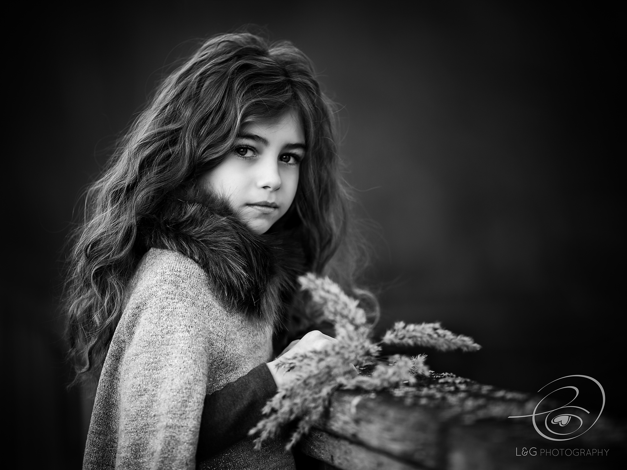 child portrait of girl in black and white