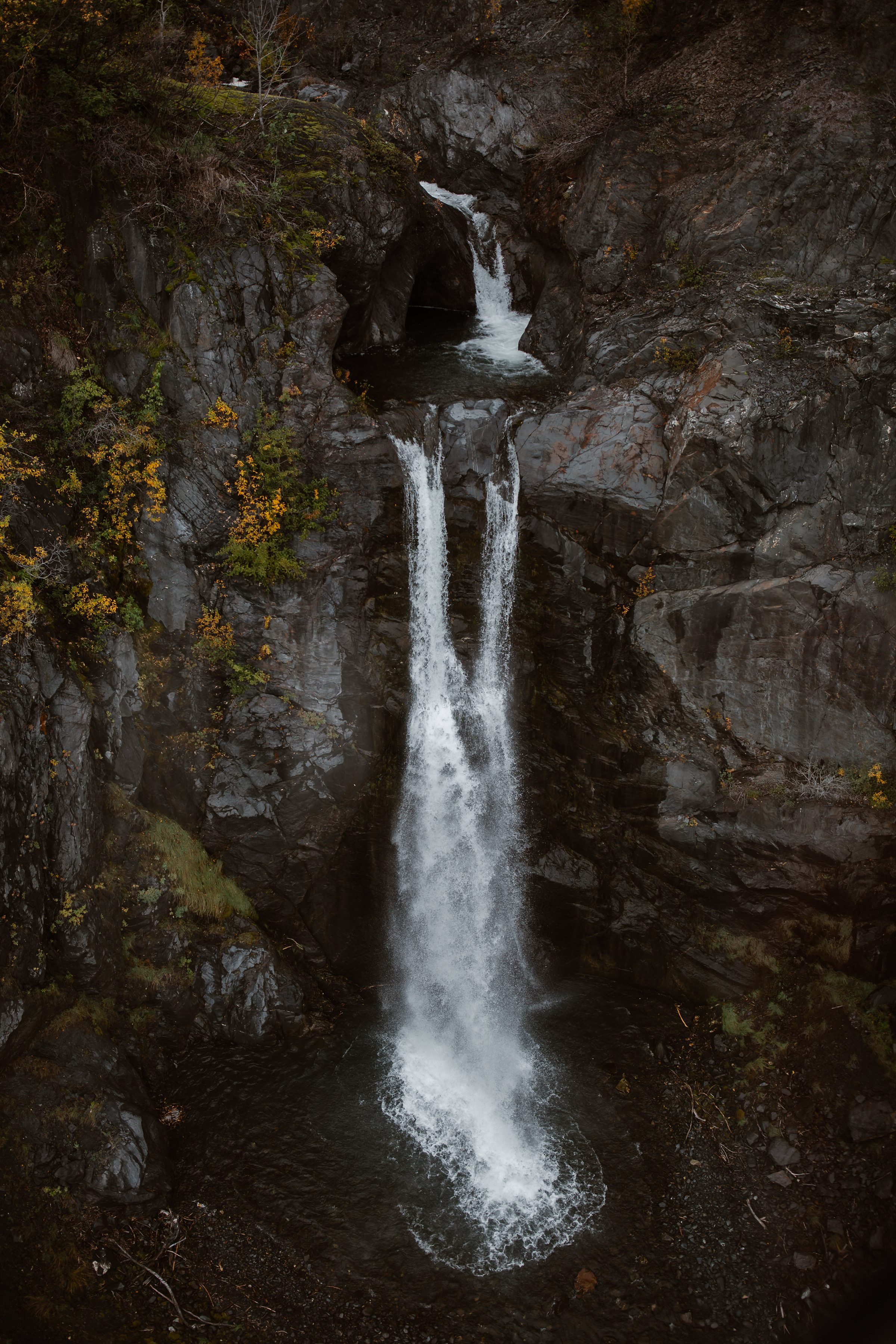  aerial photo of waterfall in Chugach State Park 