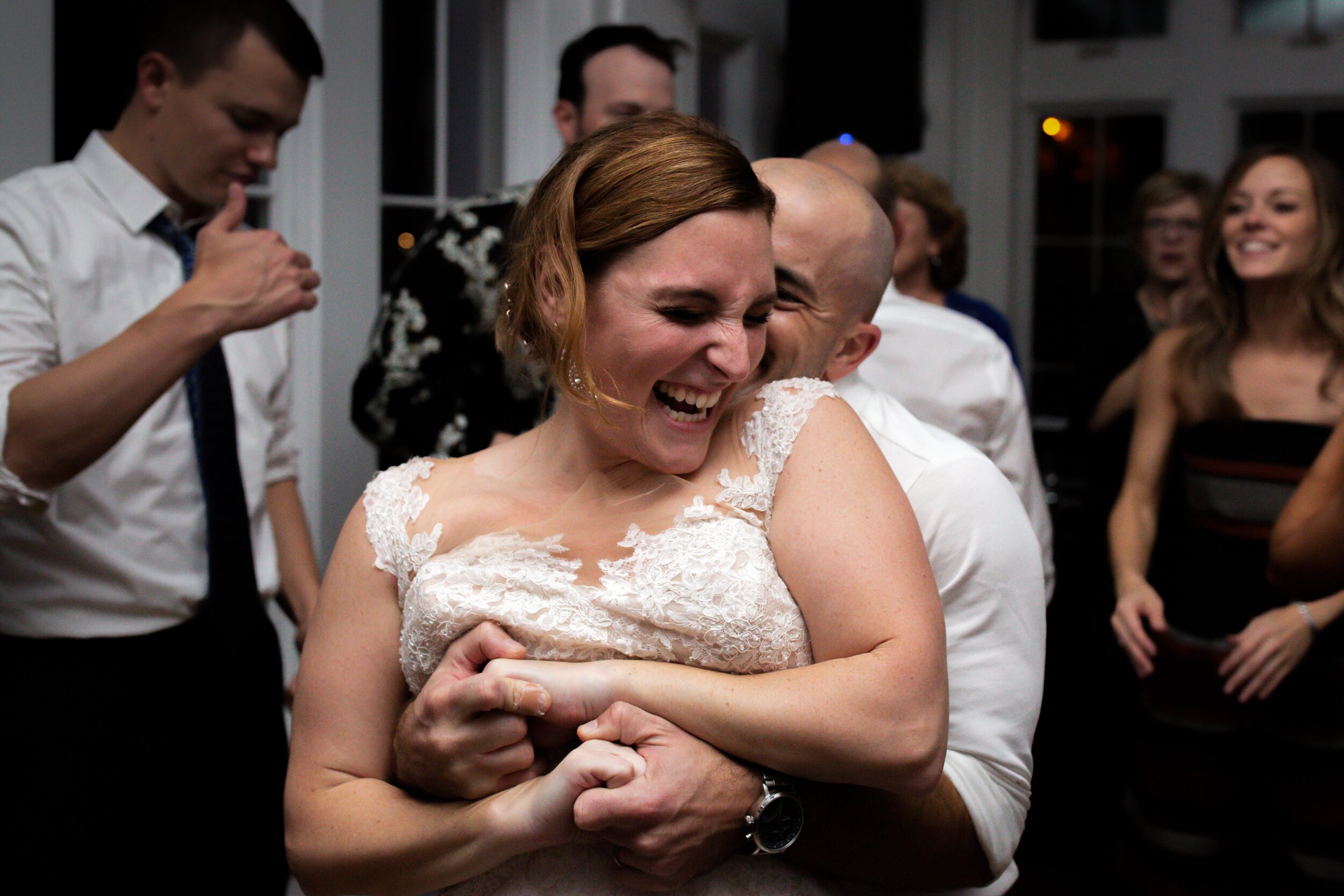 groom-hugging-bride-reception-arlington-va.jpg