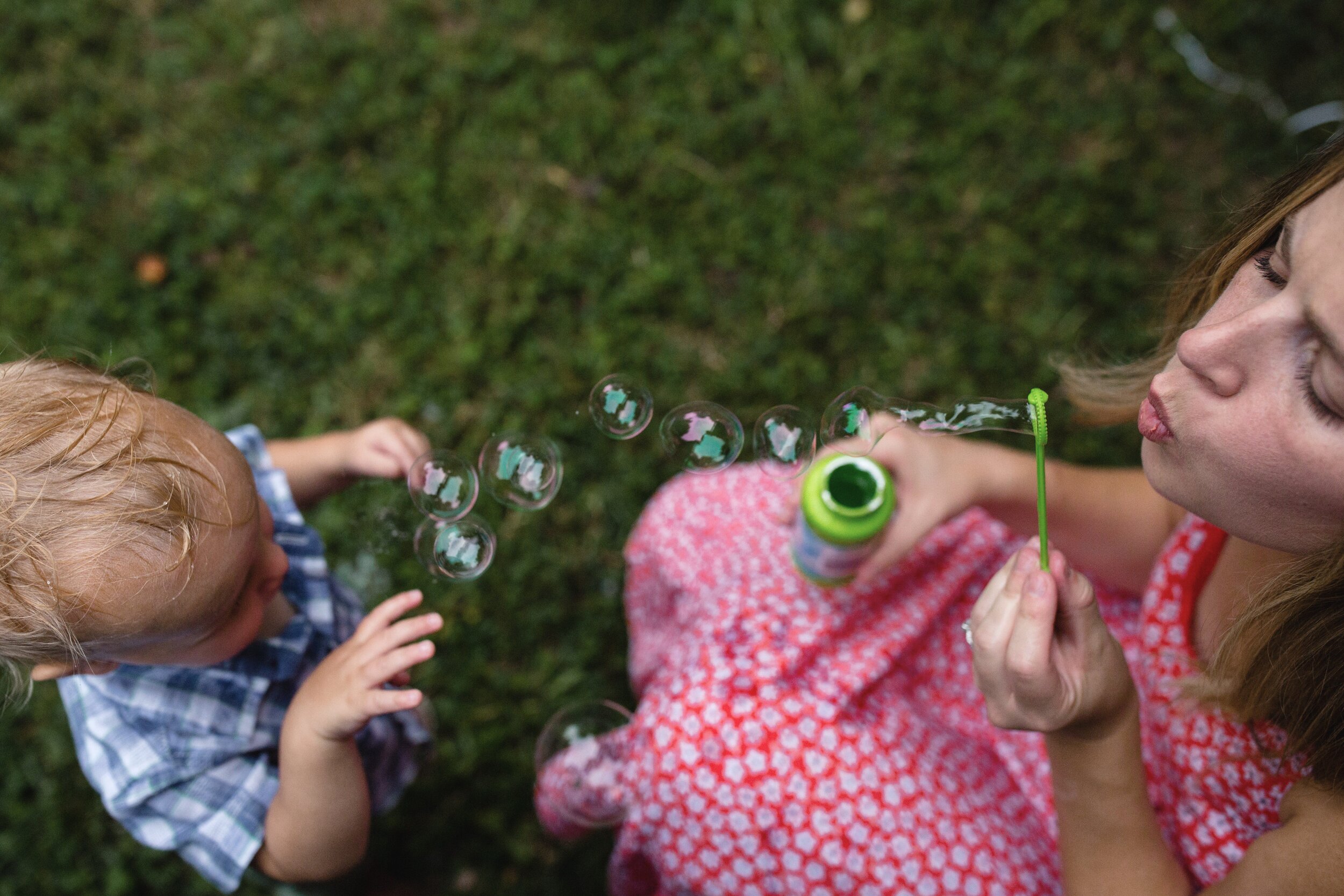 mom-blowing-bubbles-with-toddler.JPG