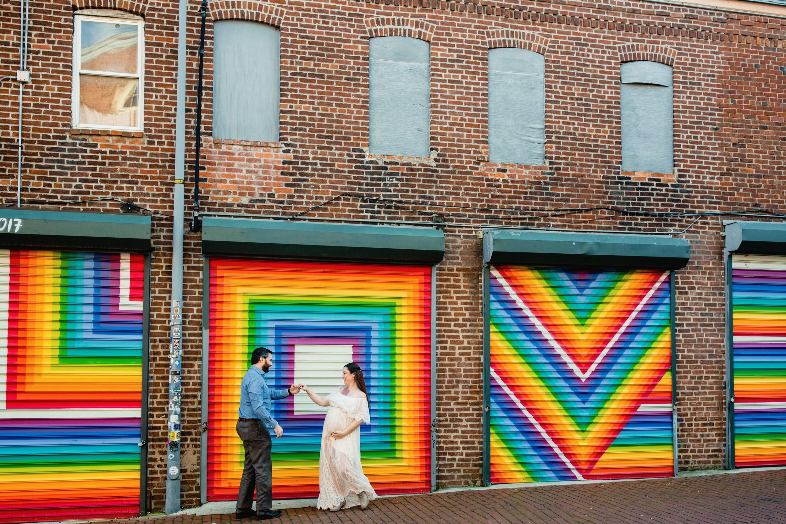 pregant-couple-at-love-mural-washington-dc.jpg