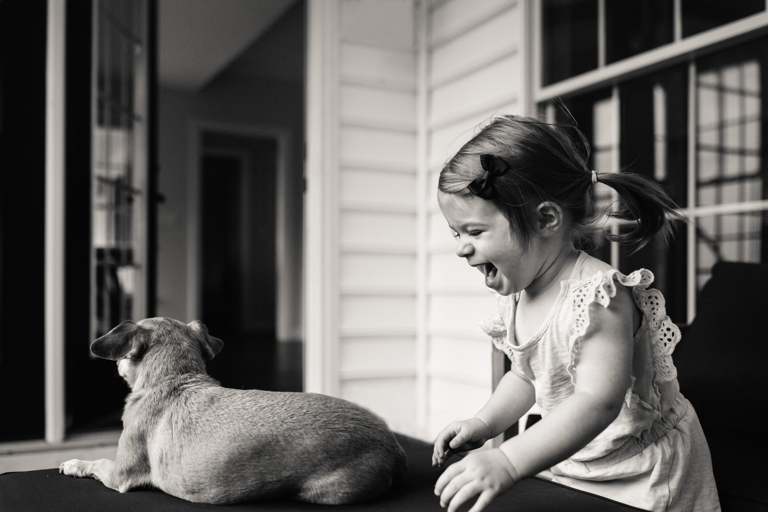 girl-laughing-with-dog.jpg