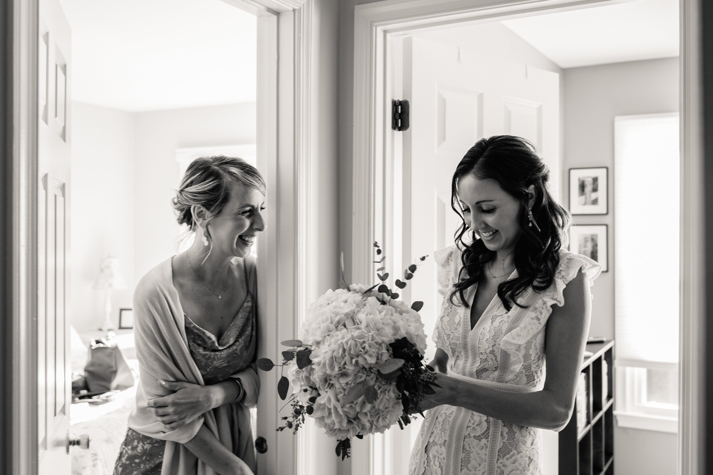 bride-laughing-with-sister-before-wedding.jpg