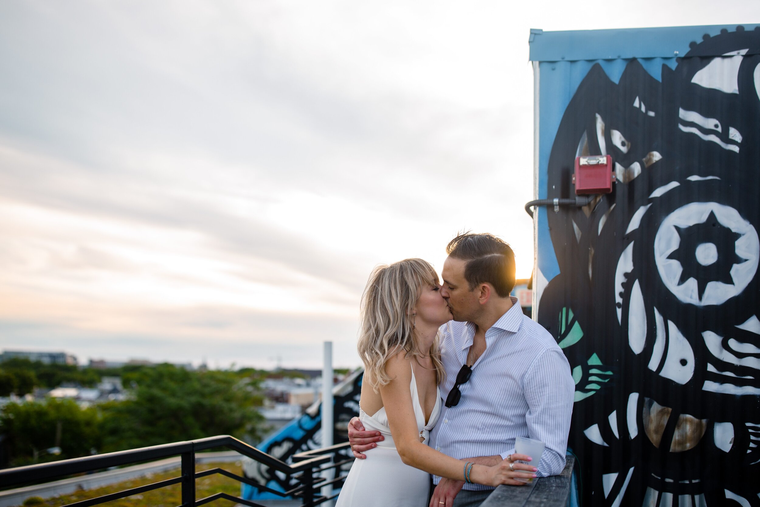 bride-groom-kissing-on-rooftop-in-washington-dc.jpg