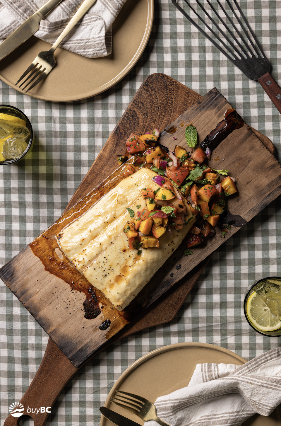 Honey-glazed cedar planked Halibut with grilled peach salsa