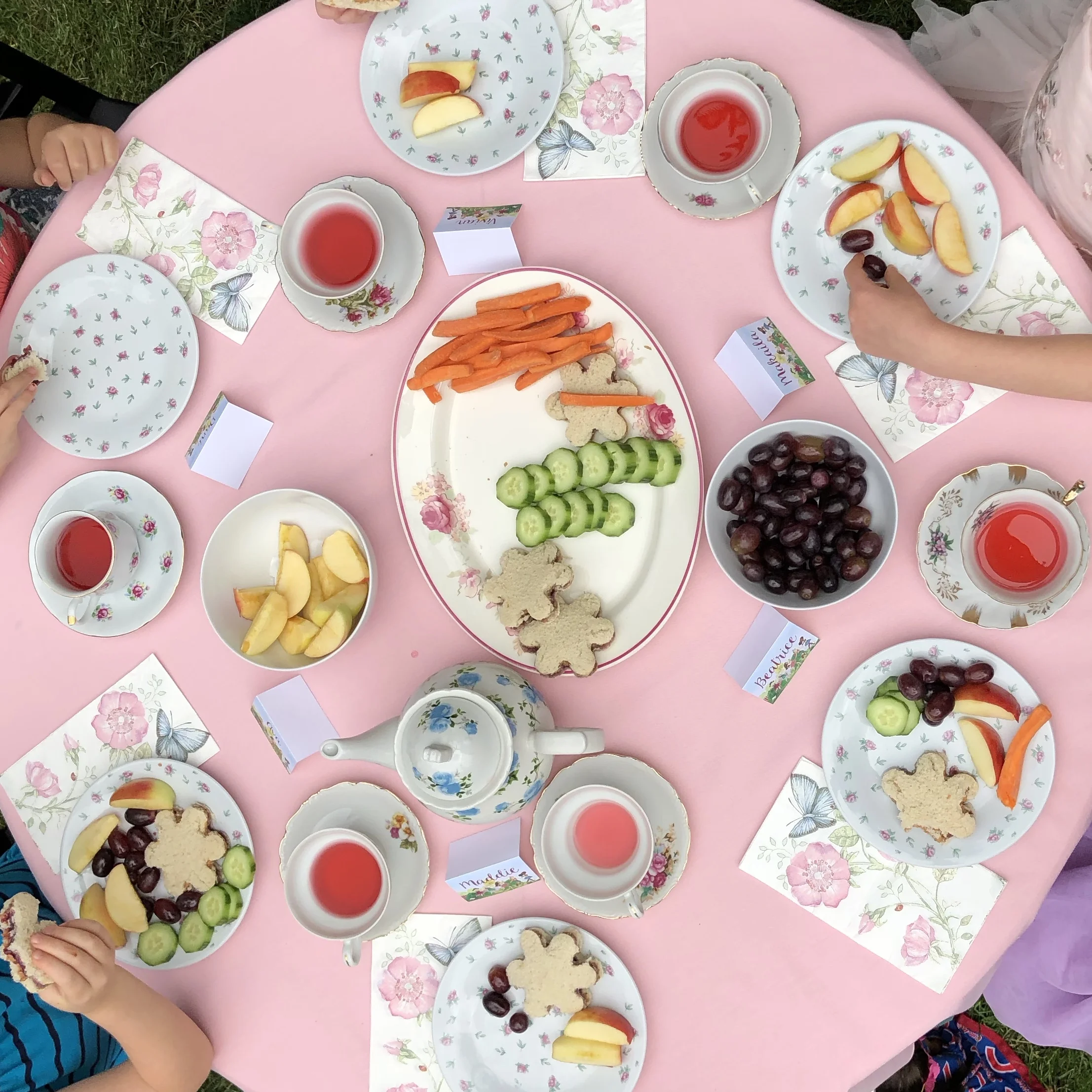 A flower cookie cutter made ordinary peanut butter and jelly sandwiches fancy and guests enjoyed Trader Joe’s Berries & Cherries tea.