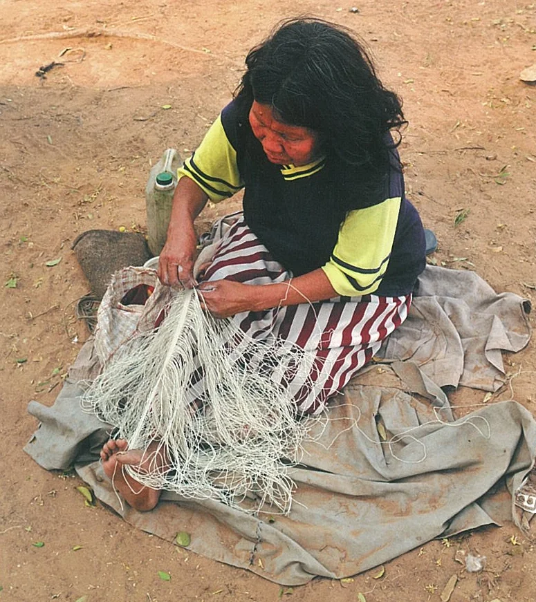 Traditional handwoven artisan-made plant fiber bags created by the fair trade women's weaving cooperative to empower Totobiegosode women, their families, and their community organization. 