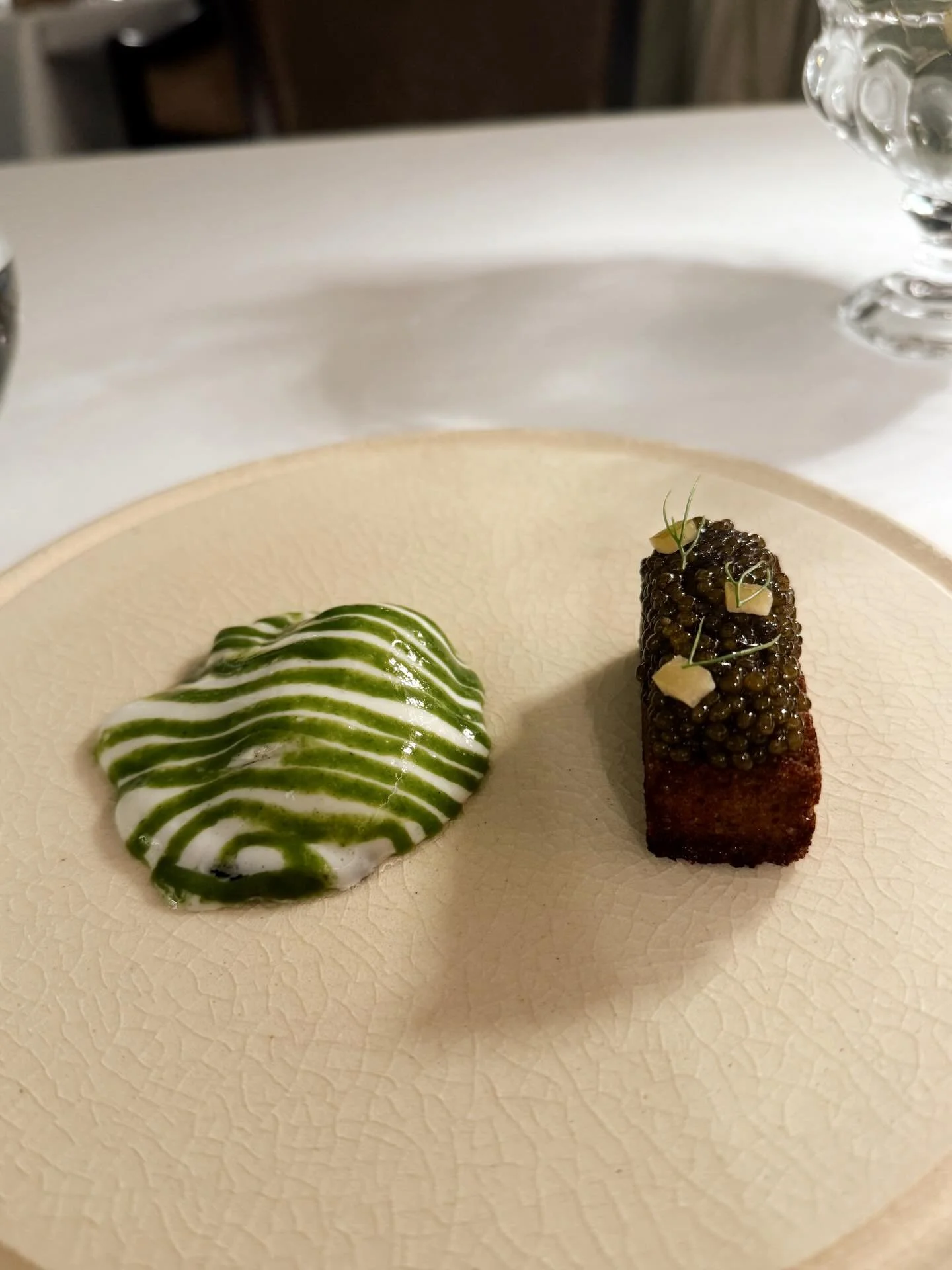 Loved this vegetable forward Michelin Star dinner I had @laupihodomainedemanville . Not a scrap of meat on my menu and it was so refreshing! The first dish was my fave, a local oyster with a chivey, horseradishy sauce served next to a piece of rye br