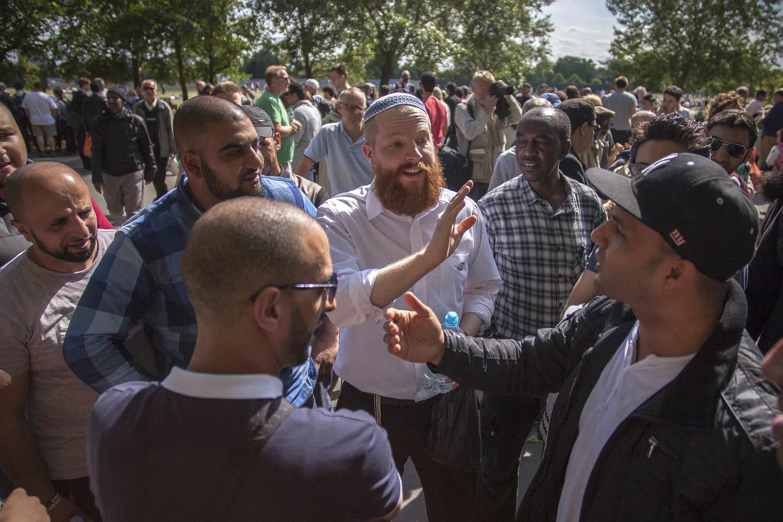 Speakers Corner, Hyde Park, London An Israeli man debates with Palestinians at Speakers Corner, a site of public debate in London for over a century.