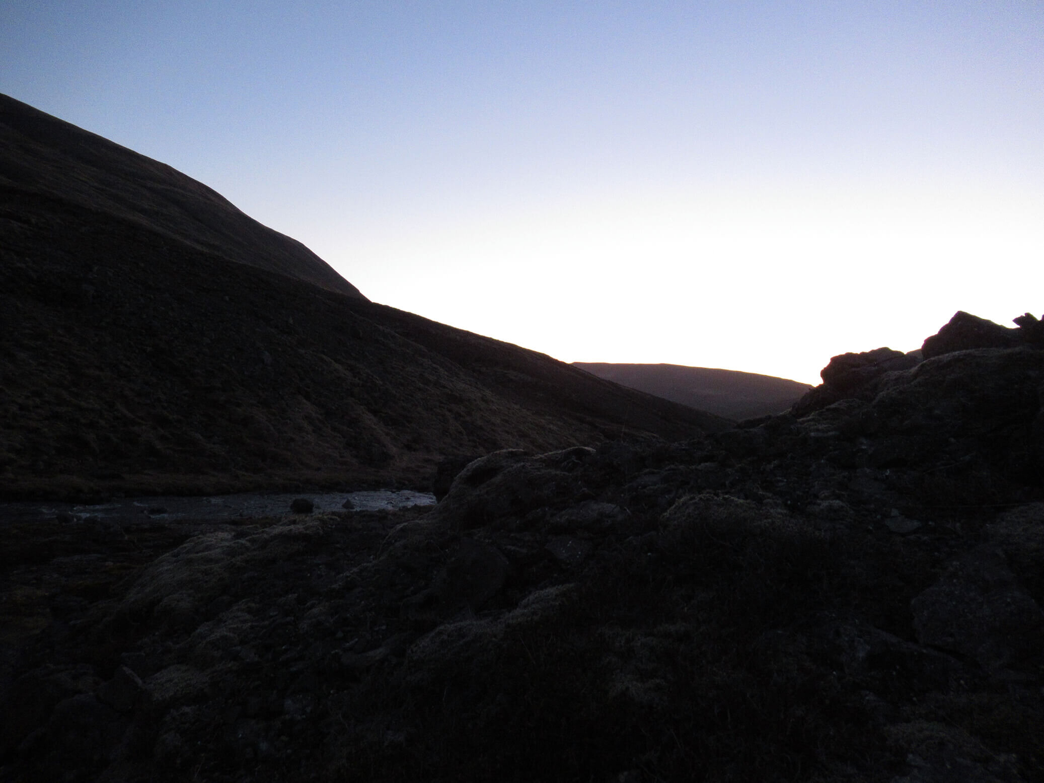 The river in twilight seen from the tiny waterfall.jpeg