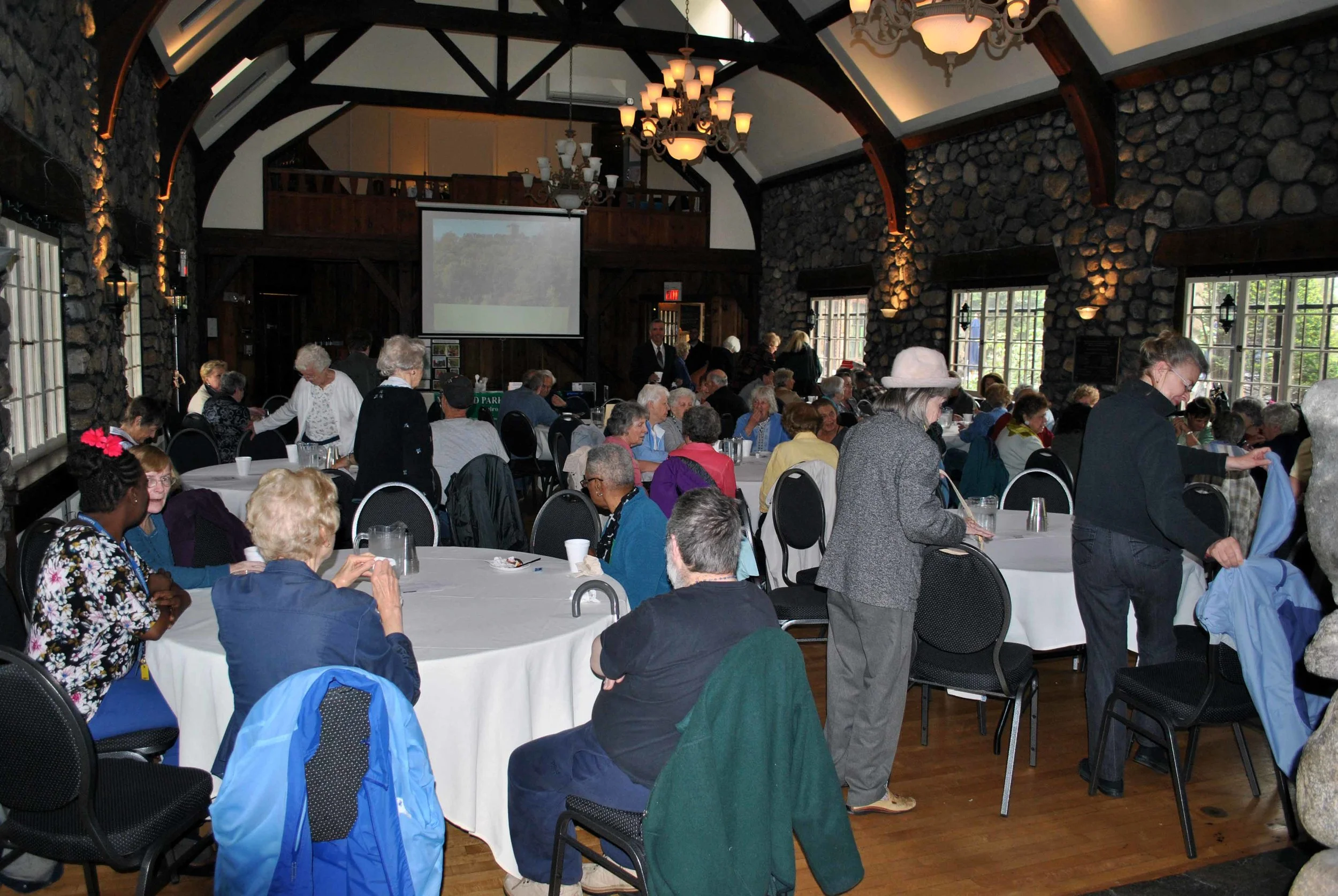 Attendees in the Main Hall at the Clubhouse at Mount Hood.