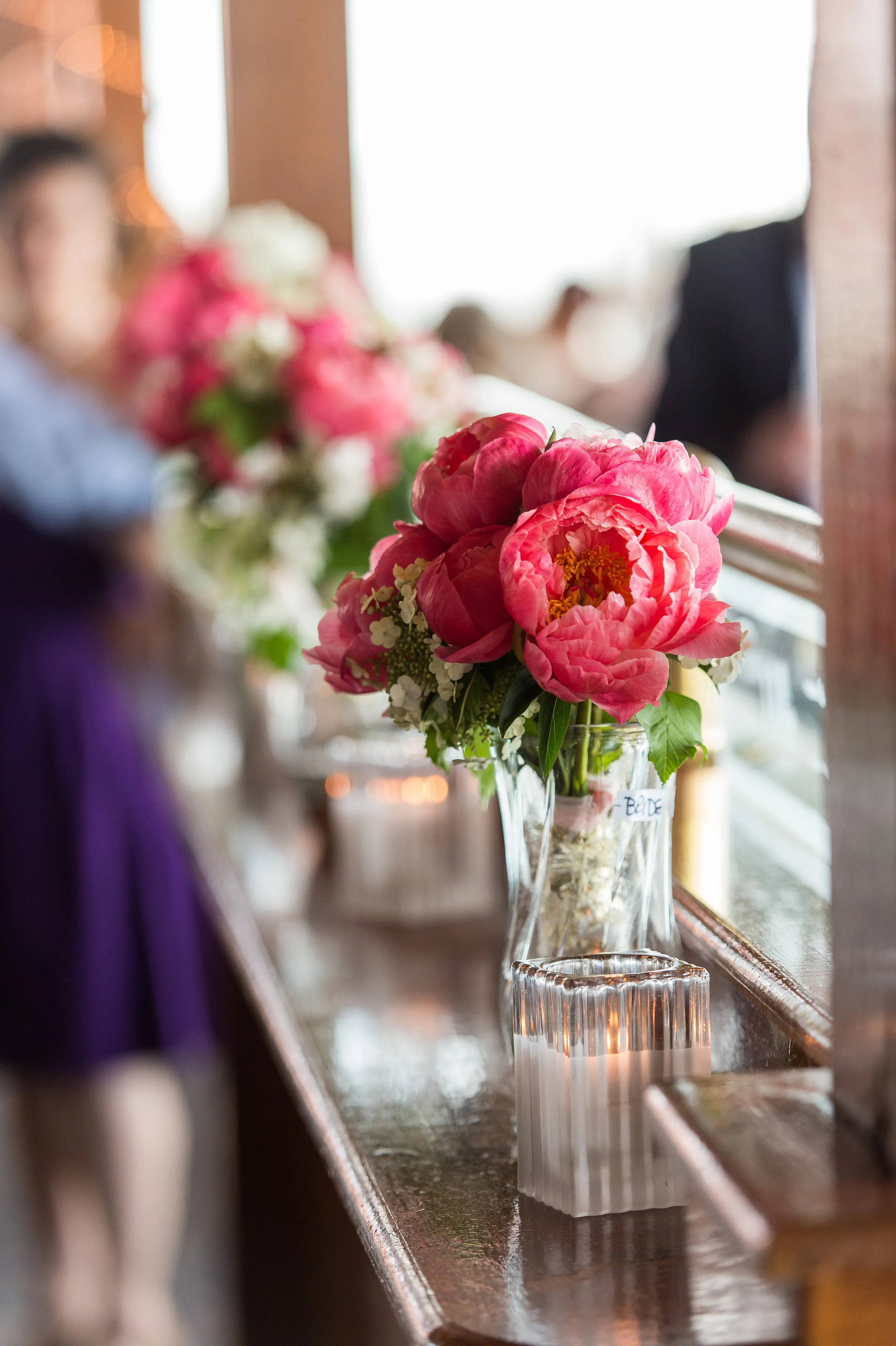 What a pretty pop of color. The bouquets are used for decoration after the I Do's.