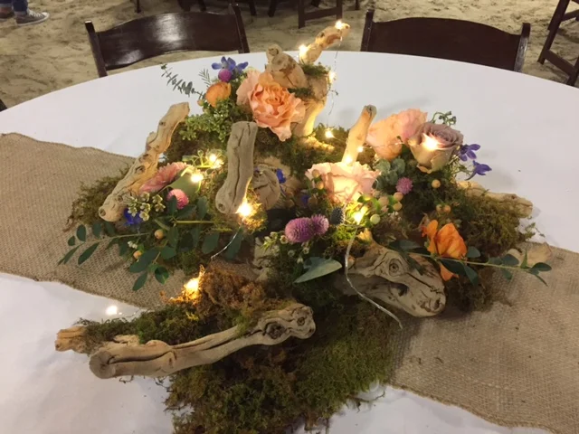 Fresh flowers, driftwood, moss and burlap. Flowers by Maddie @ Flourish