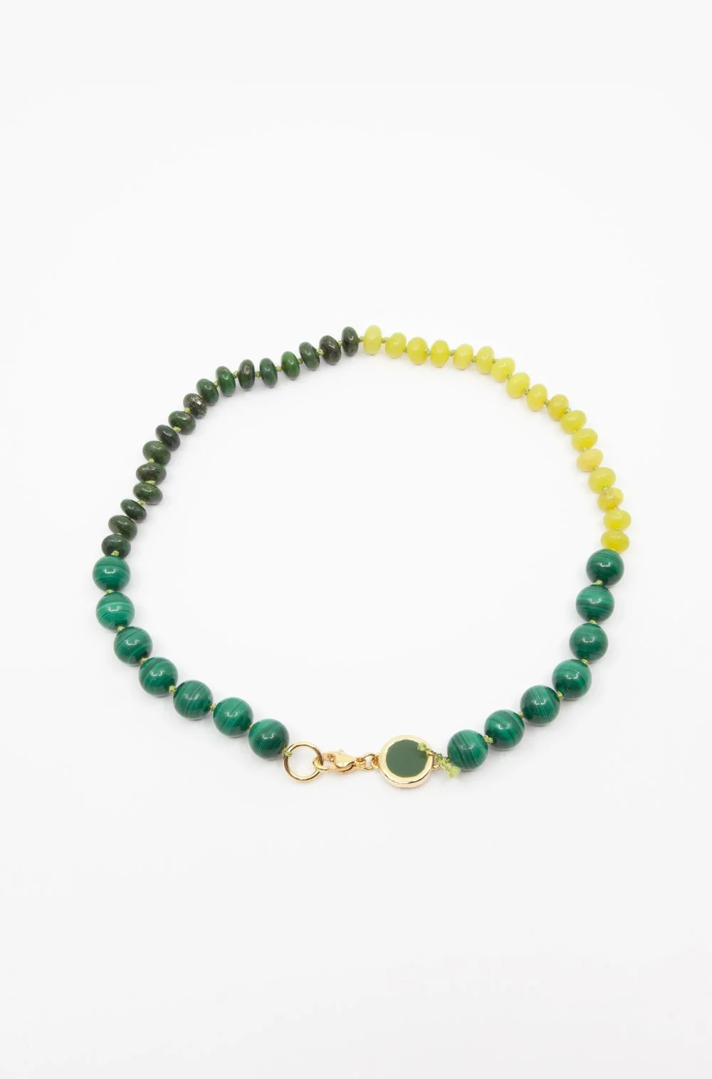 shop beaded necklace in green at a carnevale