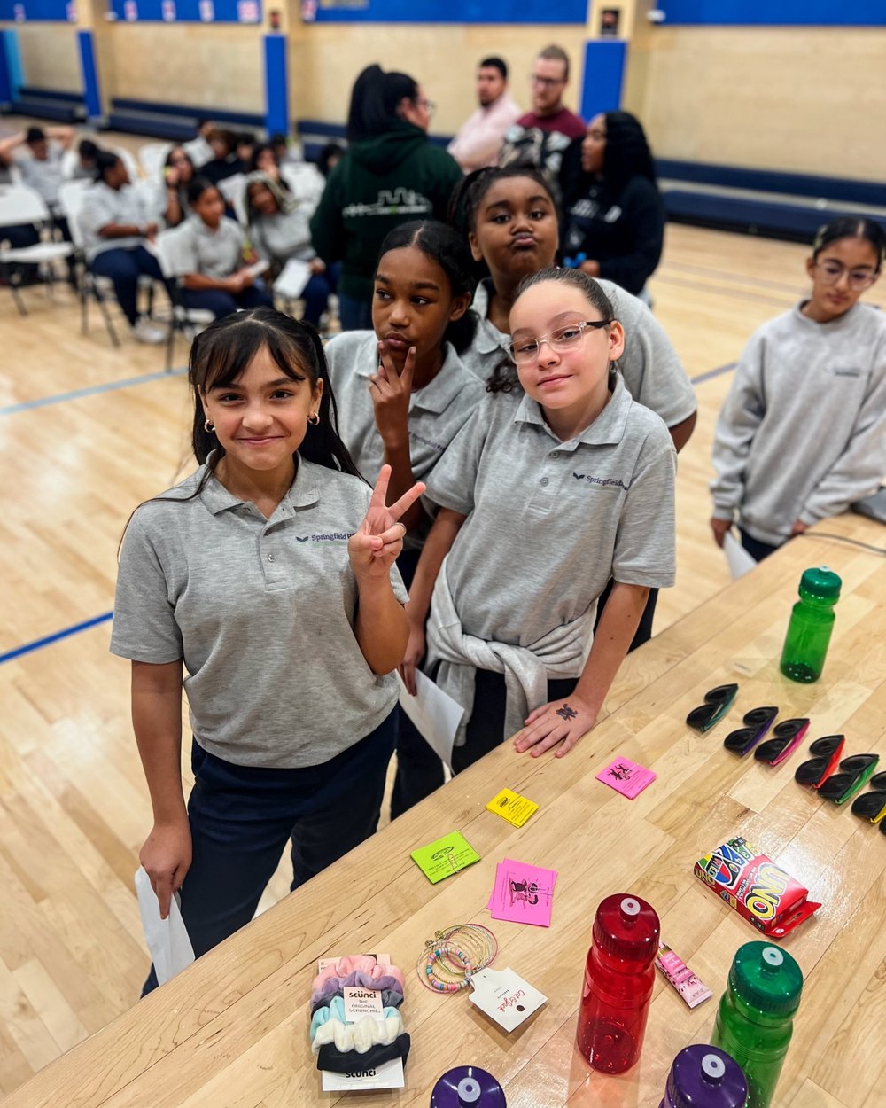  Twice a year, at our middle school auction, scholars get to buy prizes with the “prep points” they’ve earned for positive behavior. Some prizes include water bottles, accessories, pizza &amp; donut raffles, and the most popular of all - a ticket to 