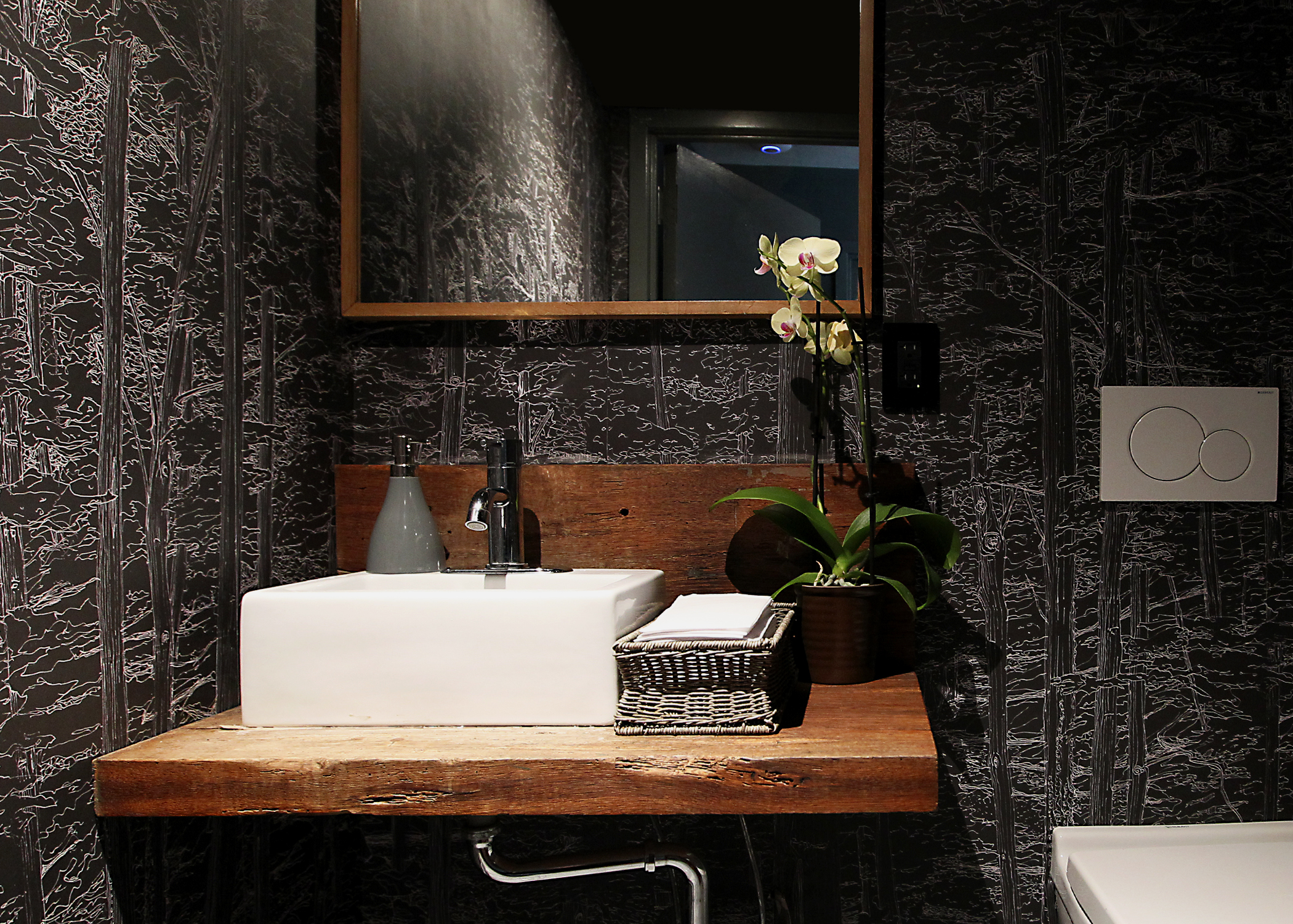 The bathrooms, refreshed with a new, unique, custom-designed wall paper to all walls and ceilings, create an ablutions experience unlike any other in NYC.