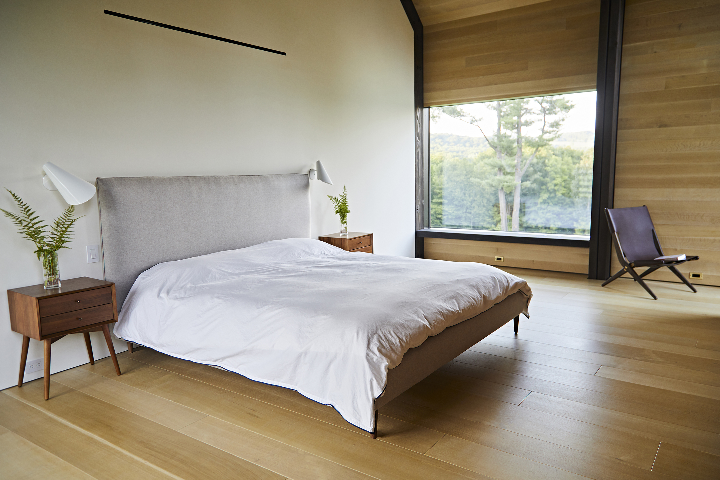 Natural White oak was used as flooring, wall linings and ceiling linings throughout the entire ground level of the barn-like residence