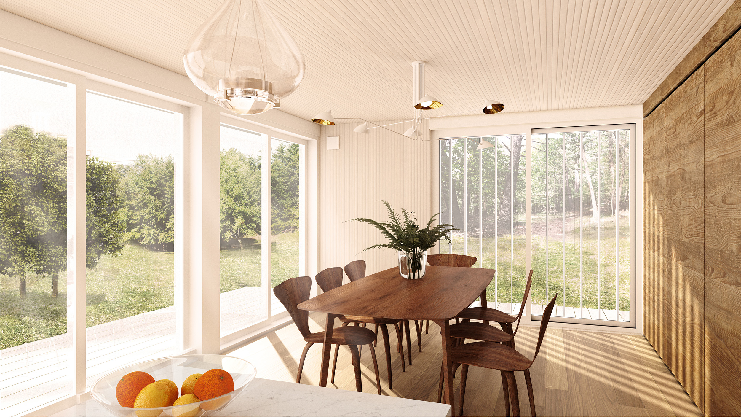 The Dining Area has full-height cabinetry and glazing with views down towards the pond and flanking rocky ridges