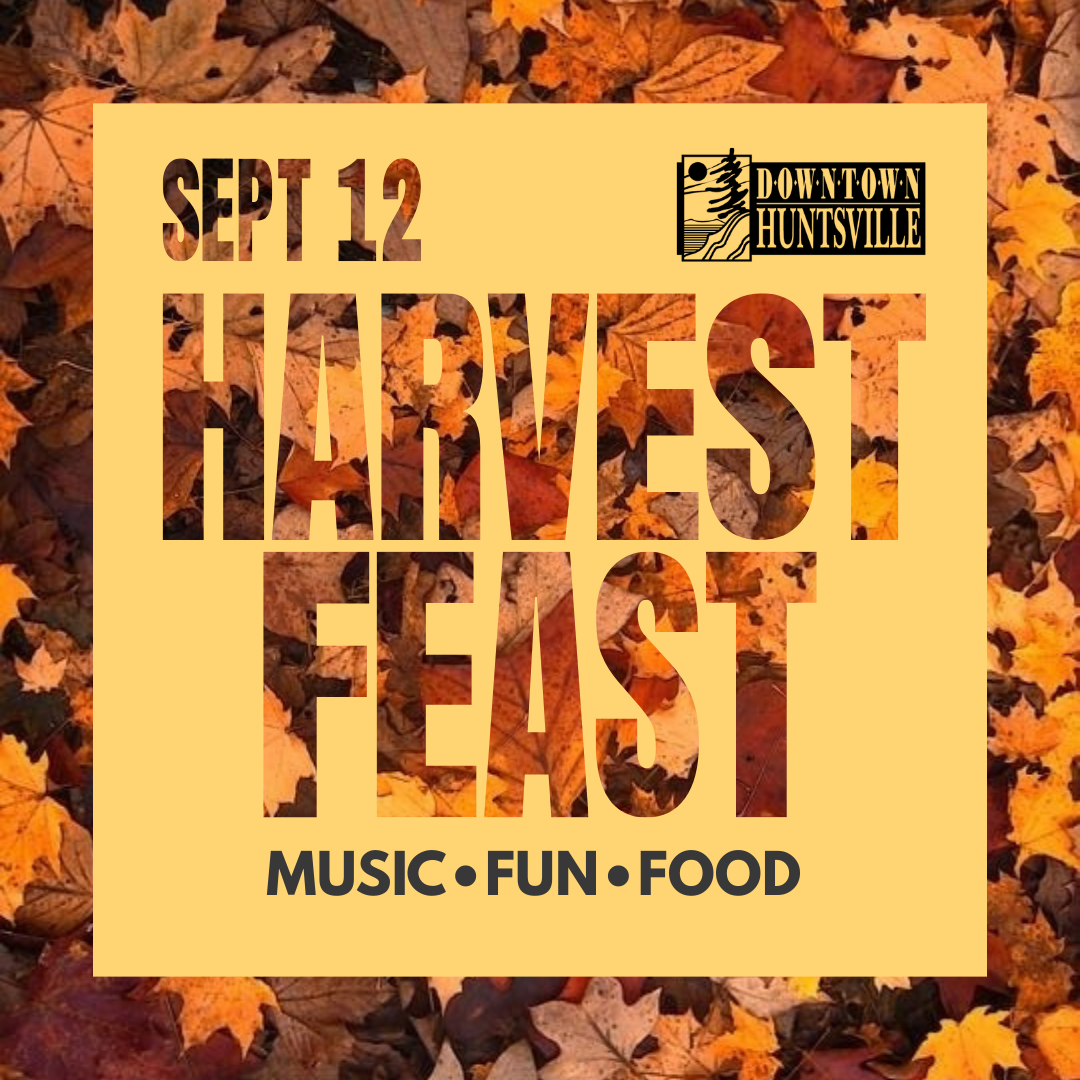 Aerial view of a neighborhood with houses and trees, and a river with a bridge. A banner overlay says 'Coming Soon!'