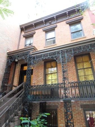 HISTORIC 1852 ROWHOUSE FACADE RESTORATION