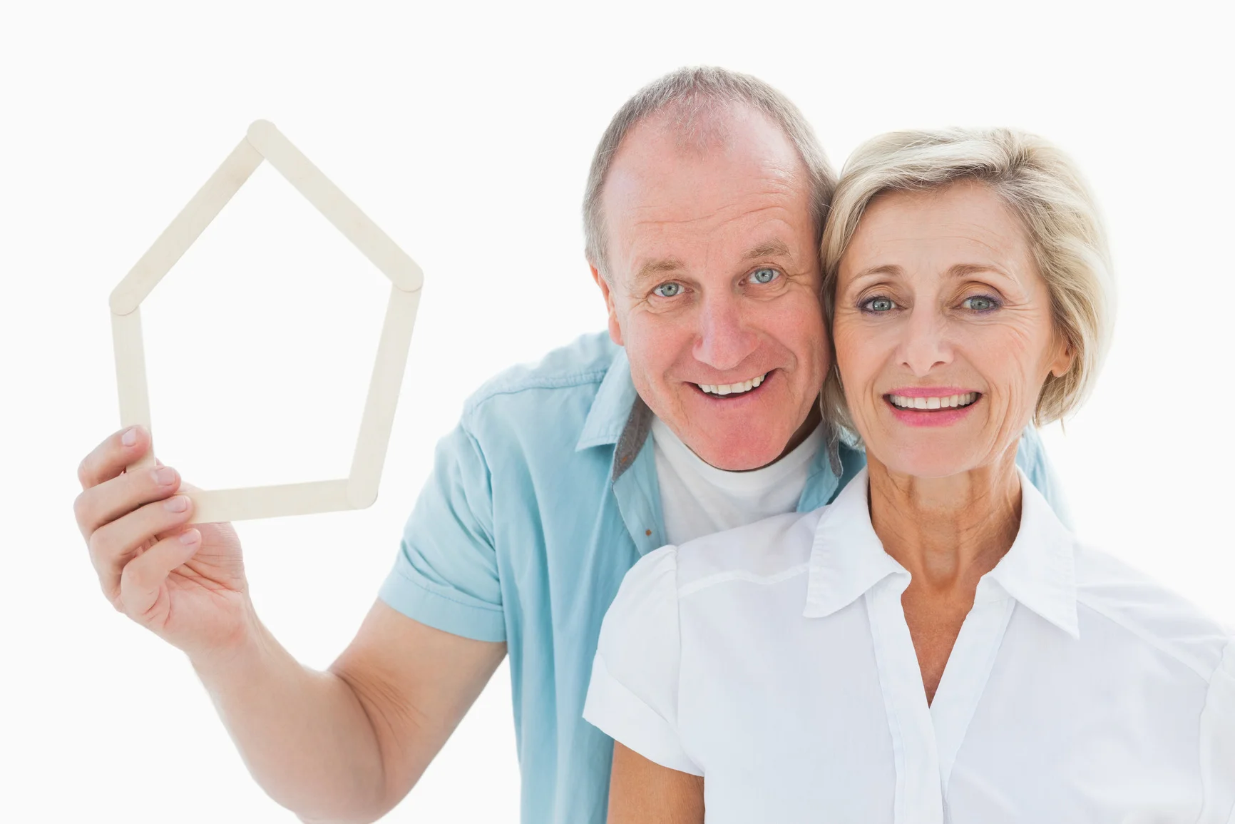 photodune-8673784-happy-older-couple-holding-house-shape-on-white-background-m.jpg