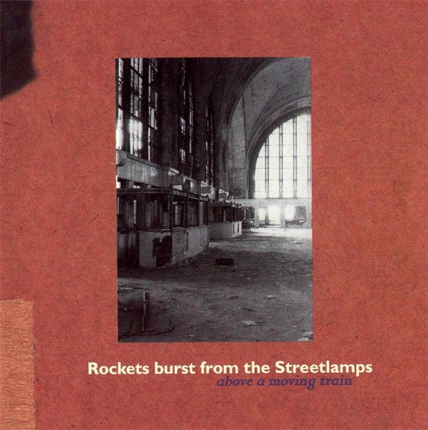 Arch 05 - Rockets Burst from the Steetlamps - Above a Moving Train - CD