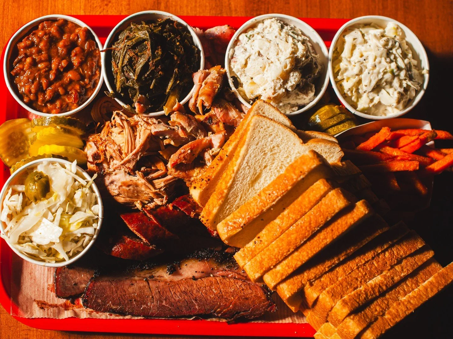 We've got that Big Jim Platter energy. 💪 Feed the fam with 1/2 lb. servings of chopped or sliced Brisket, Pulled Pork, Chopped Chicken, a Smoked Hot Link AND 6 sides. 

#BBQ #PulledPork #Brisket #SmokedHotLinks #ChoppedChicken #LouisvilleFood #Louis