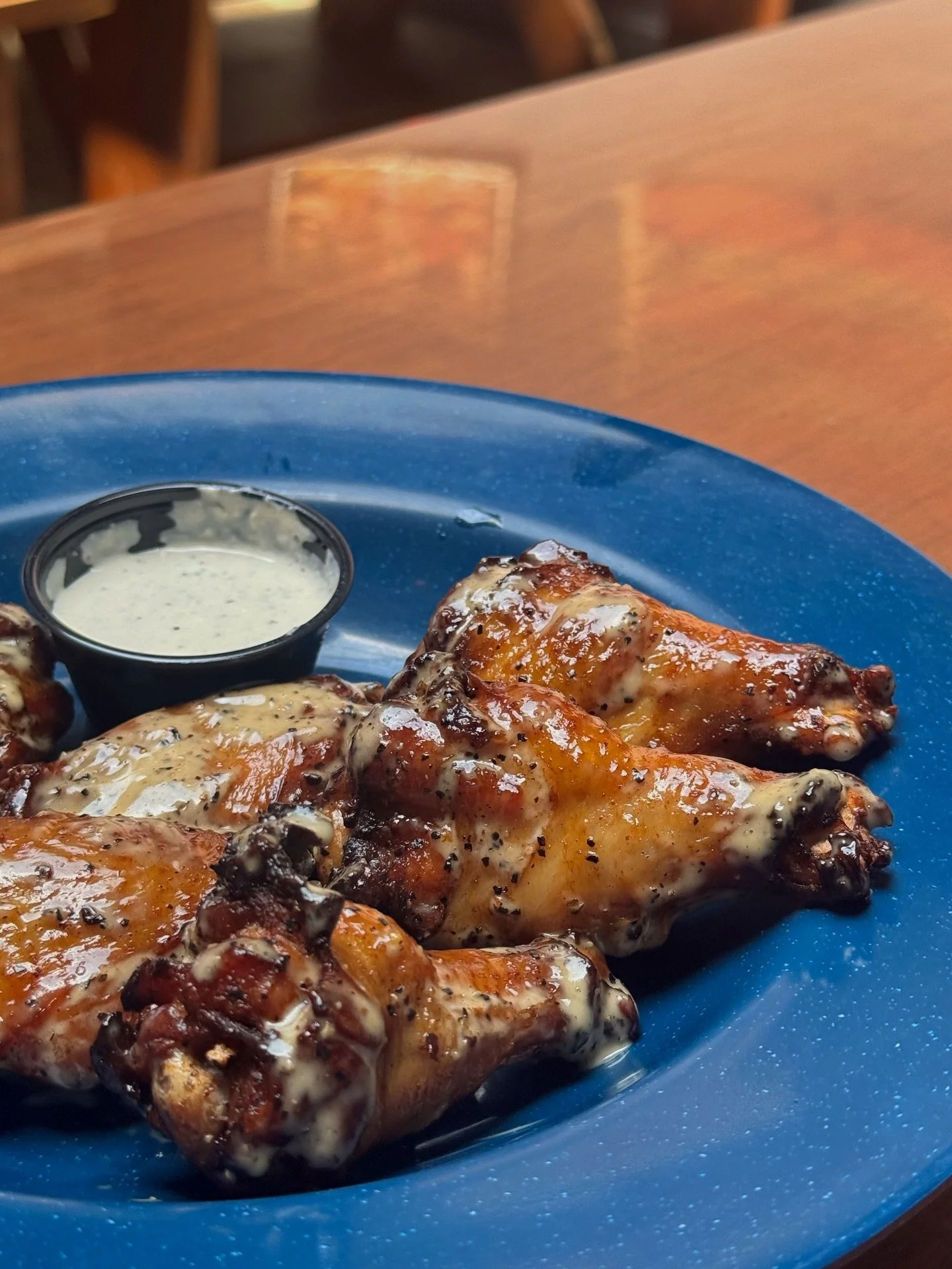 We&rsquo;ve updated the lineup with a few new ways to take your wings! You can now get a dozen or half-dozen smoked wings tossed in a BBQ Glaze or our White BBQ sauce. If you&rsquo;re looking for a different dip on the side, we have Horseradish Sauce