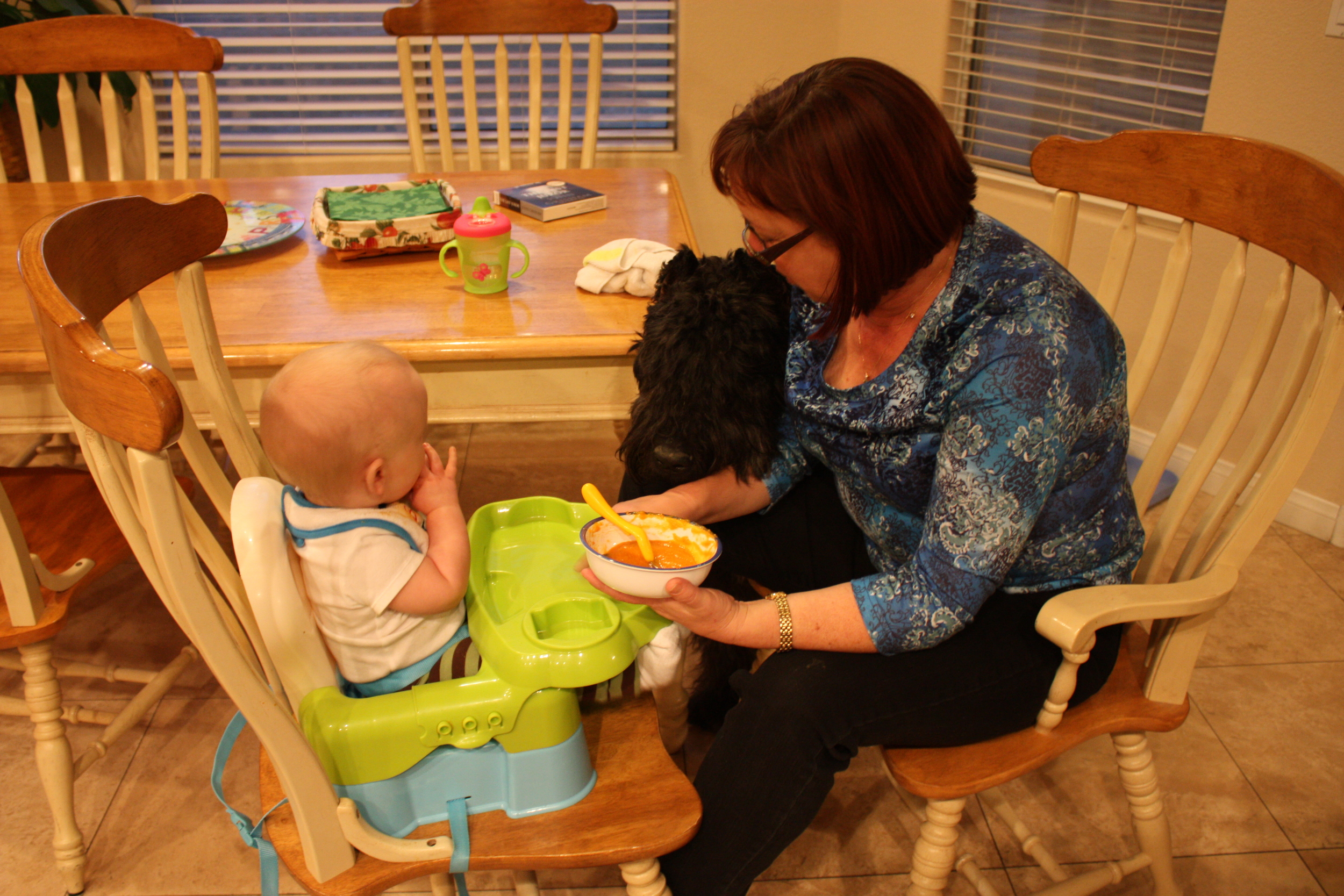  River waits patiently for the child to inevitably drop some food. 