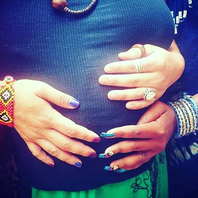 (Photo of Kandice's pregnant belly during training)