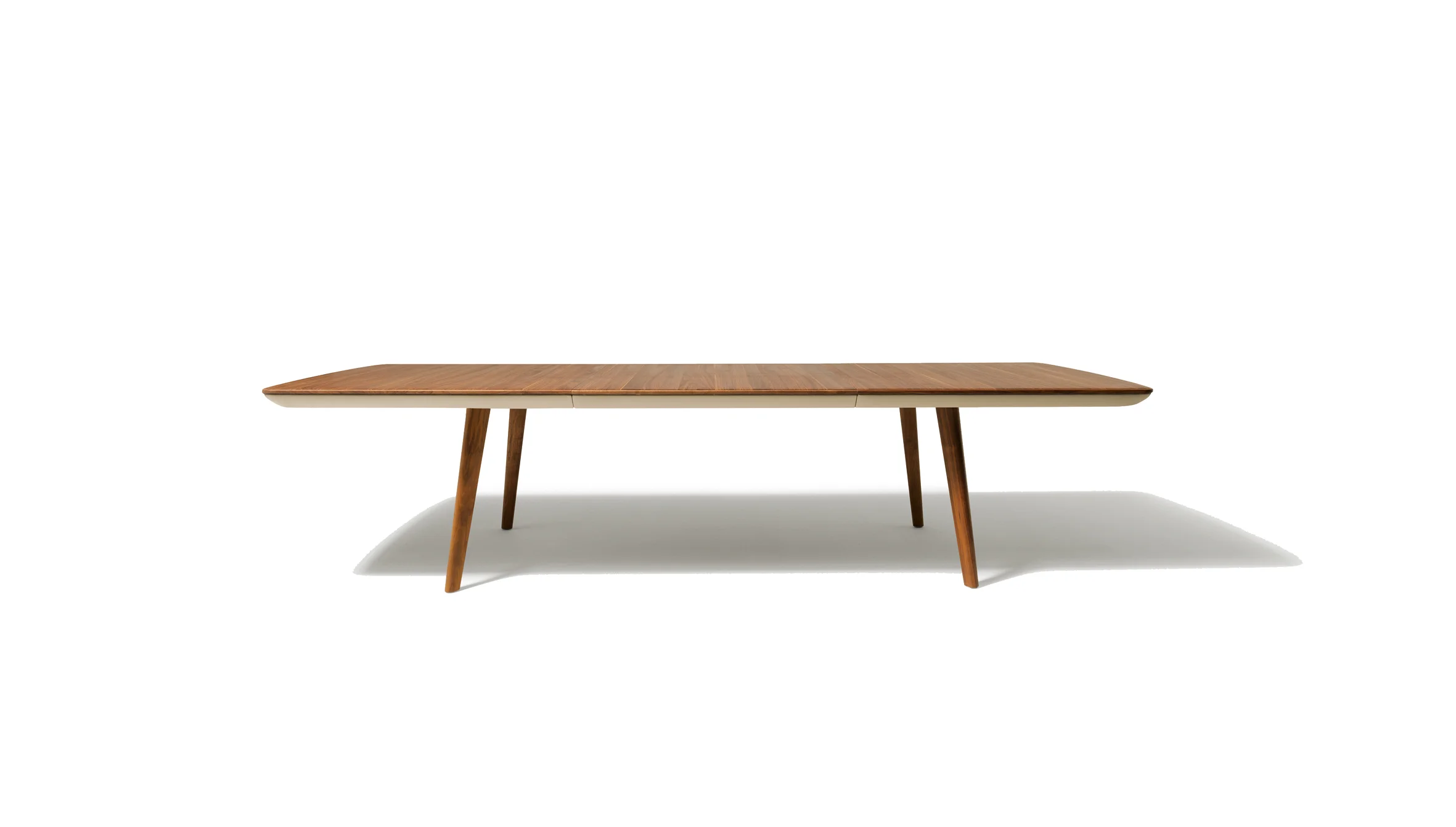 FLAYE table Thanks to revolutionary non-stop synchronised pull-out technology, the flaye table can be quickly and easily extended by 100 cm in one single movement. You can therefore create space for four additional seats in next to no time. This patented innovation is certain to impress you with its extremely convenient intuitive handling. The precise curves on the table's edges bring the natural wood to the fore and intentionally showcase the core of the highly warp-resistant three-layer panels. The elegant frame below the table top is available in wood or leather. Text/Photos/Producer: TEAM 7 Design: Jacob Strobel 2013