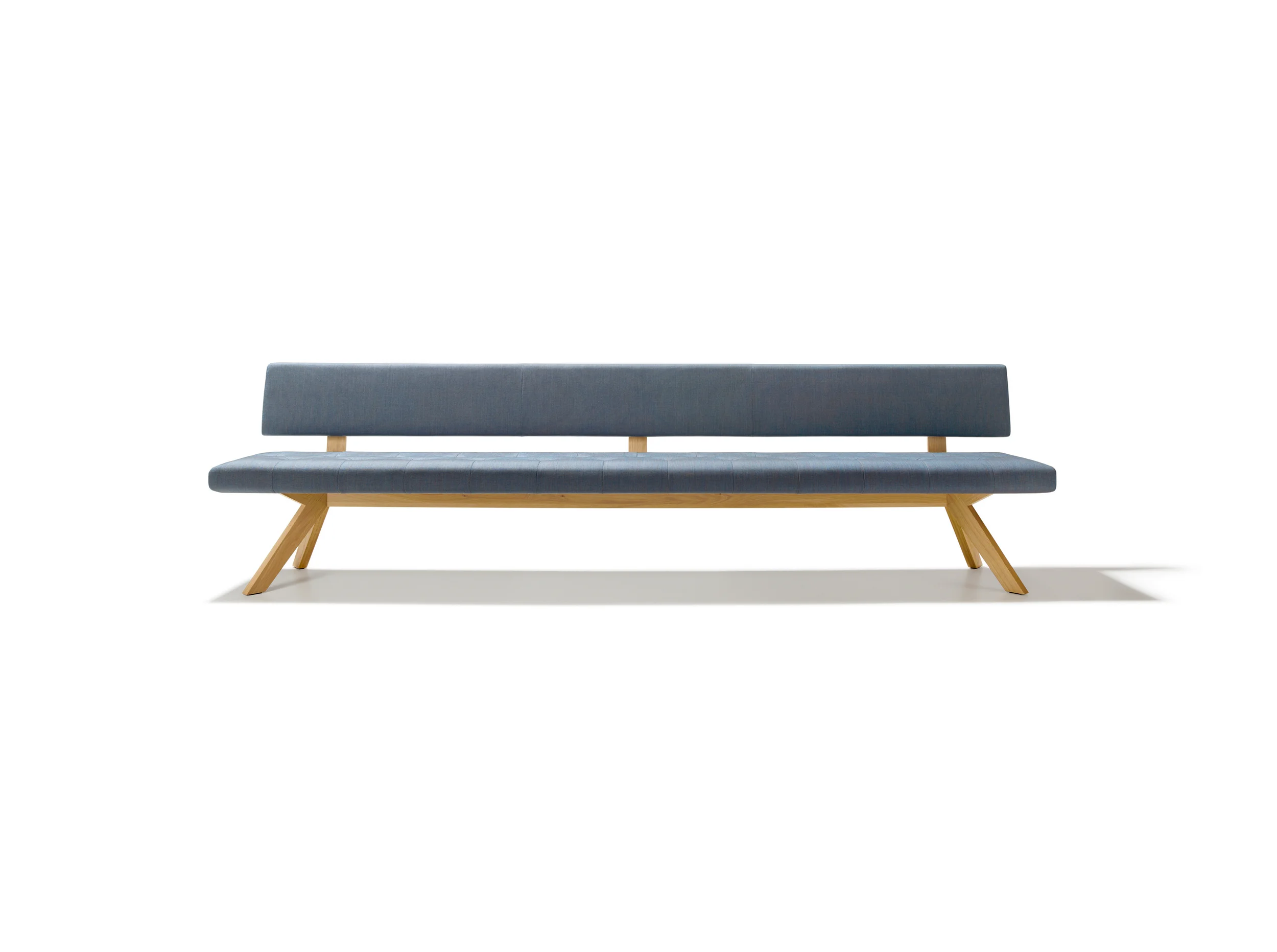 YPS bench The perfect aesthetics of simple elegance All of the elements in the yps product range are united by the continual reappearance of the “Y” shape in their design – this applies to the yps bench as well. Derived from the yps table, the ypsbench’s legs stand out immediately, and the y-shaped quilting on the upholstery reveals true craftsmanship. This feature anchors the upholstery’s appearance and balances the bench’s seat pan. The high-quality micro-pocket spring construction works together with the cold foam to provide long-lasting, superior comfort. The yps bench is available as a corner seat or a straight bench, may be upholstered with textile or leather, and comes with or without a back. Text/Photos/Producer: TEAM 7 Design: Jacob Strobel 2015