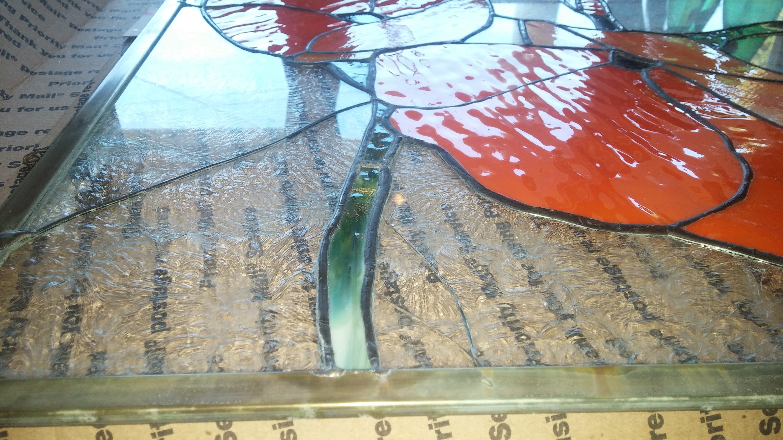 A customer made her own stained glass Poppies as a hobbyist years ago, but they didn't survive a recent move...