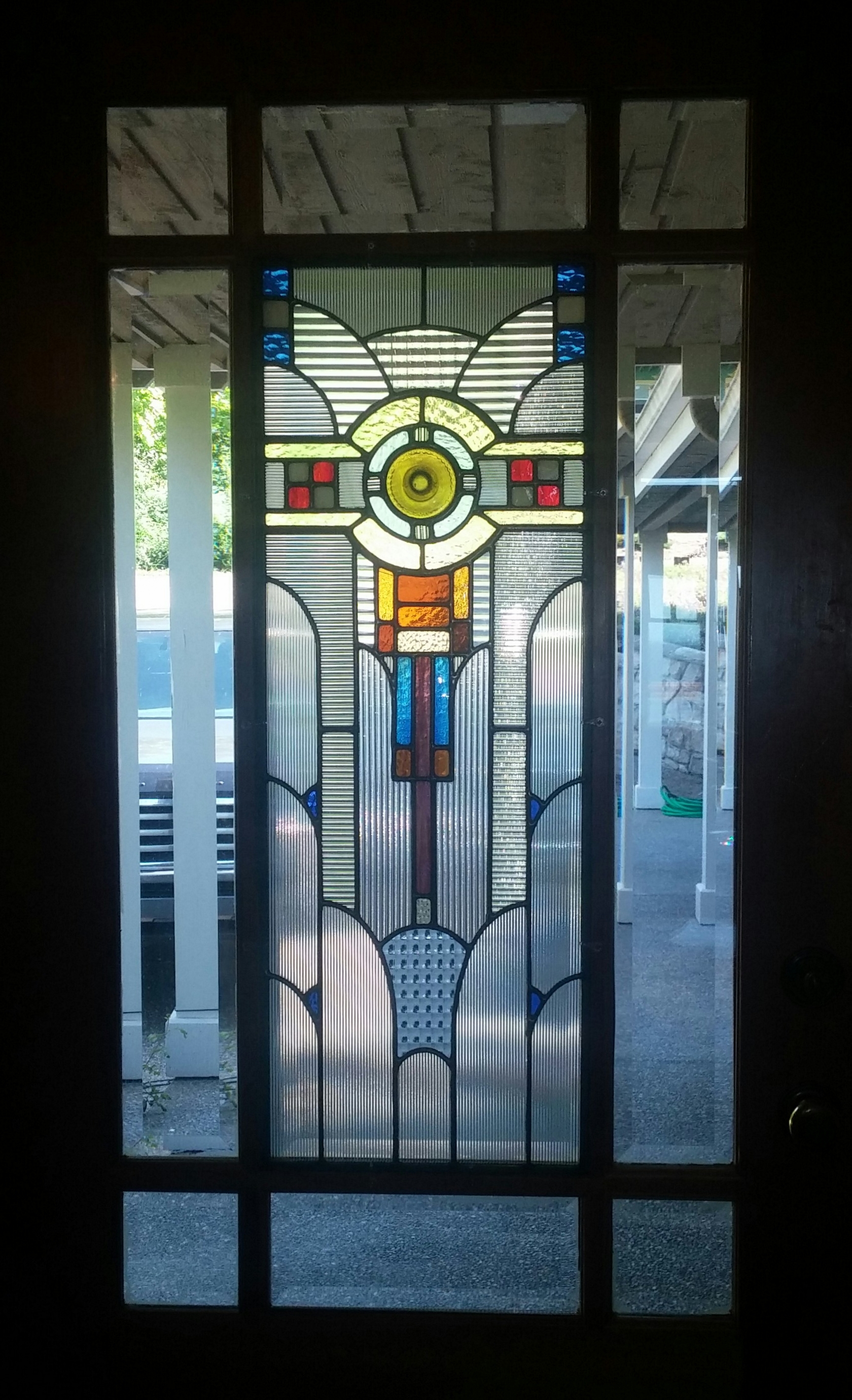 Here is the door with the finished window in place, offering privacy and beauty.