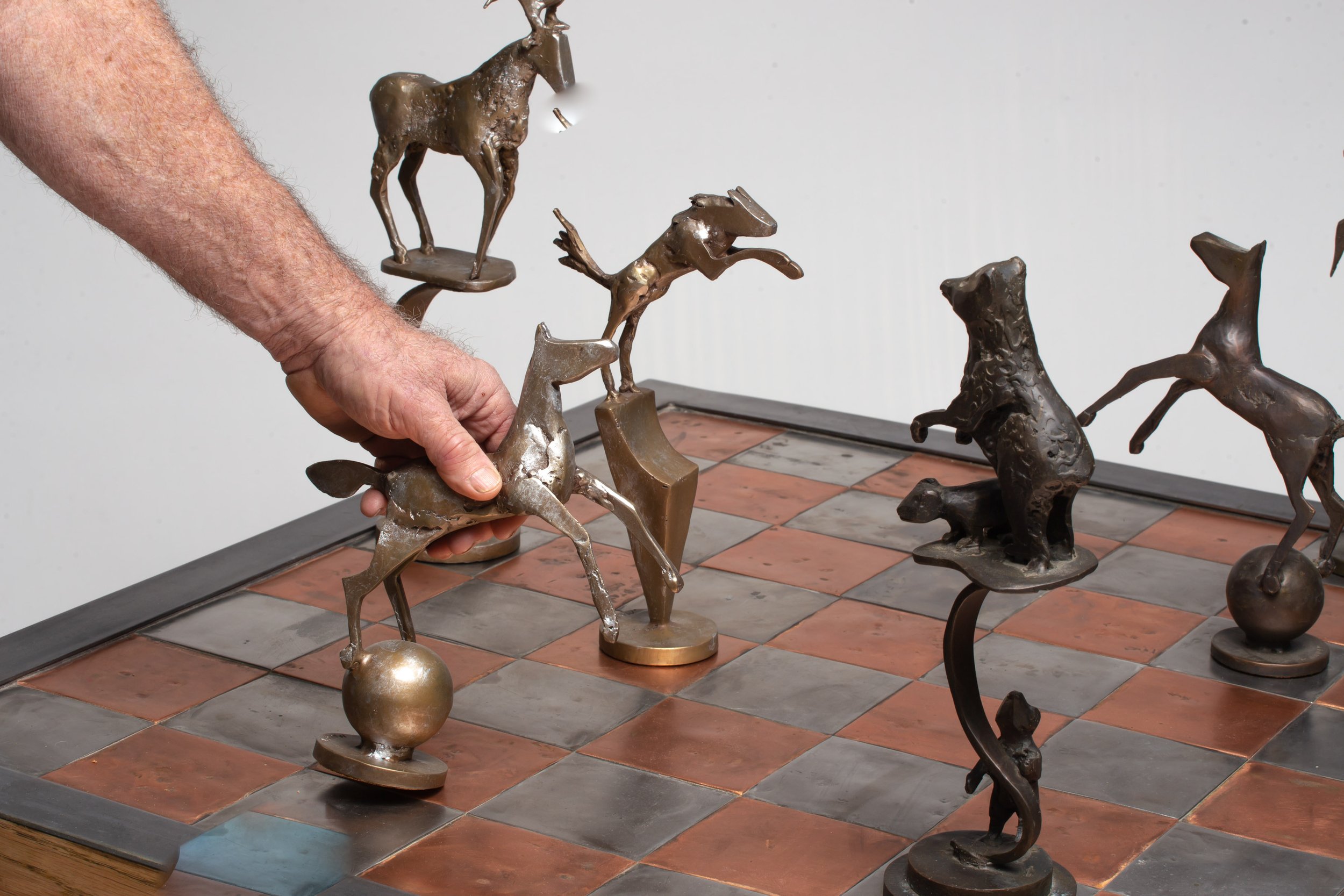 Yellowstone_chess_set_scale_hand_Marney.JPG