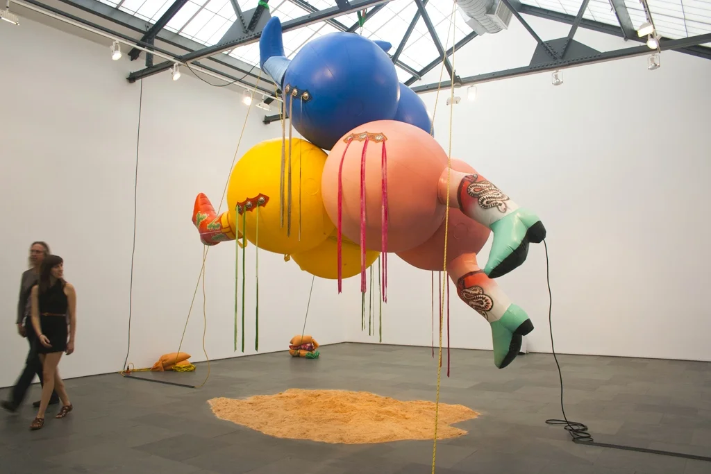 Dustup installation at Betty Cuningham Gallery, Vinyl Coasted nylon, rope, leather, blowers, sandbag, s, sawdust, 20'×20'×16, 2012‘
