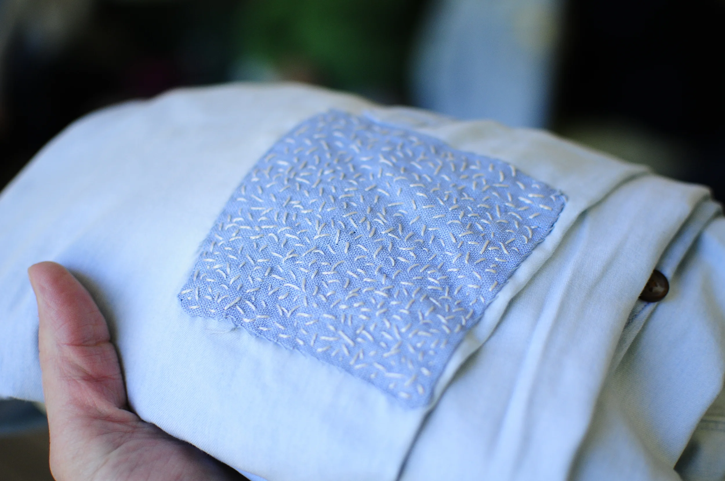 A patched shirt.