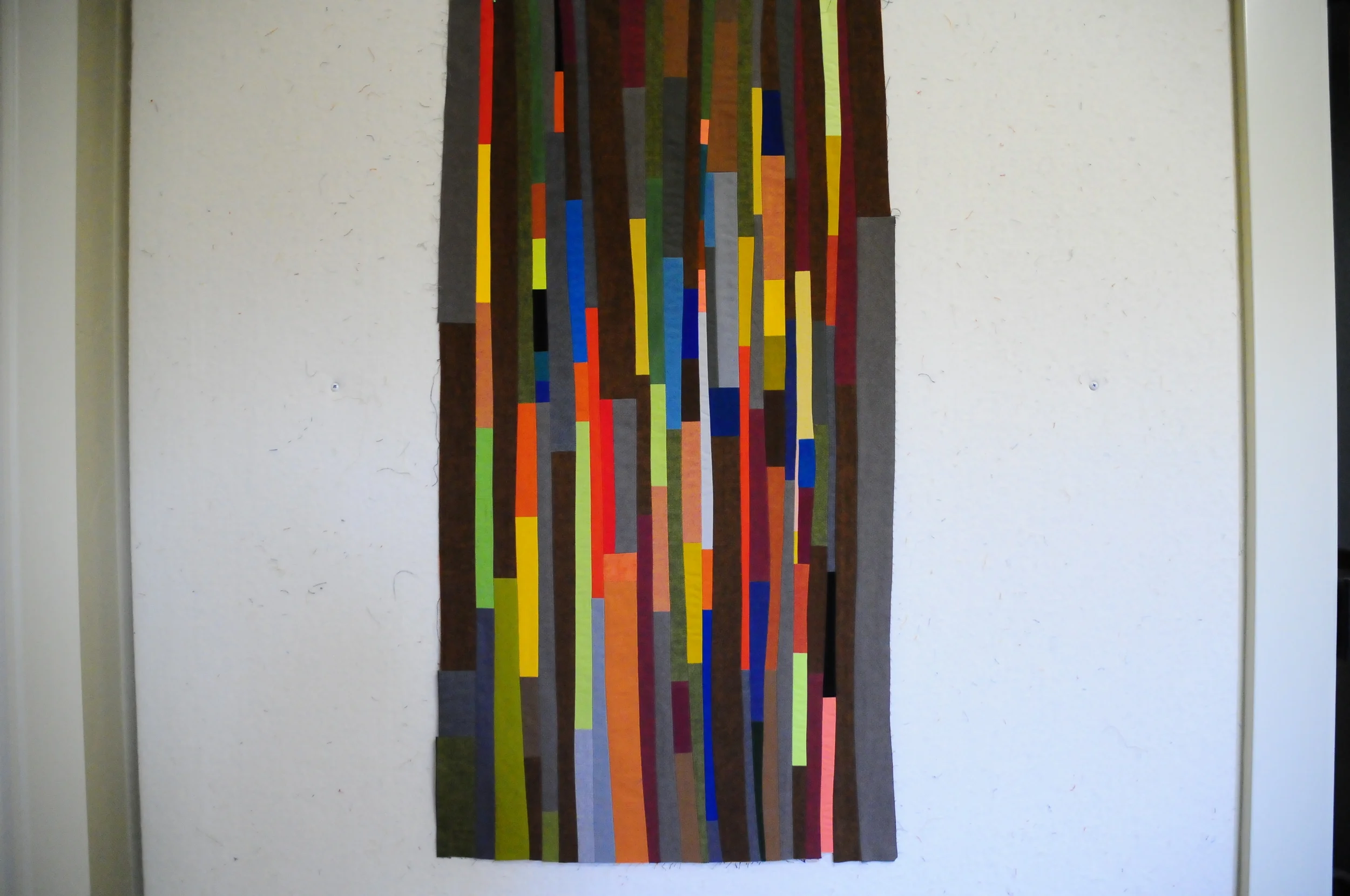 Spirit Tree top measures 19" x 37" before quilting.