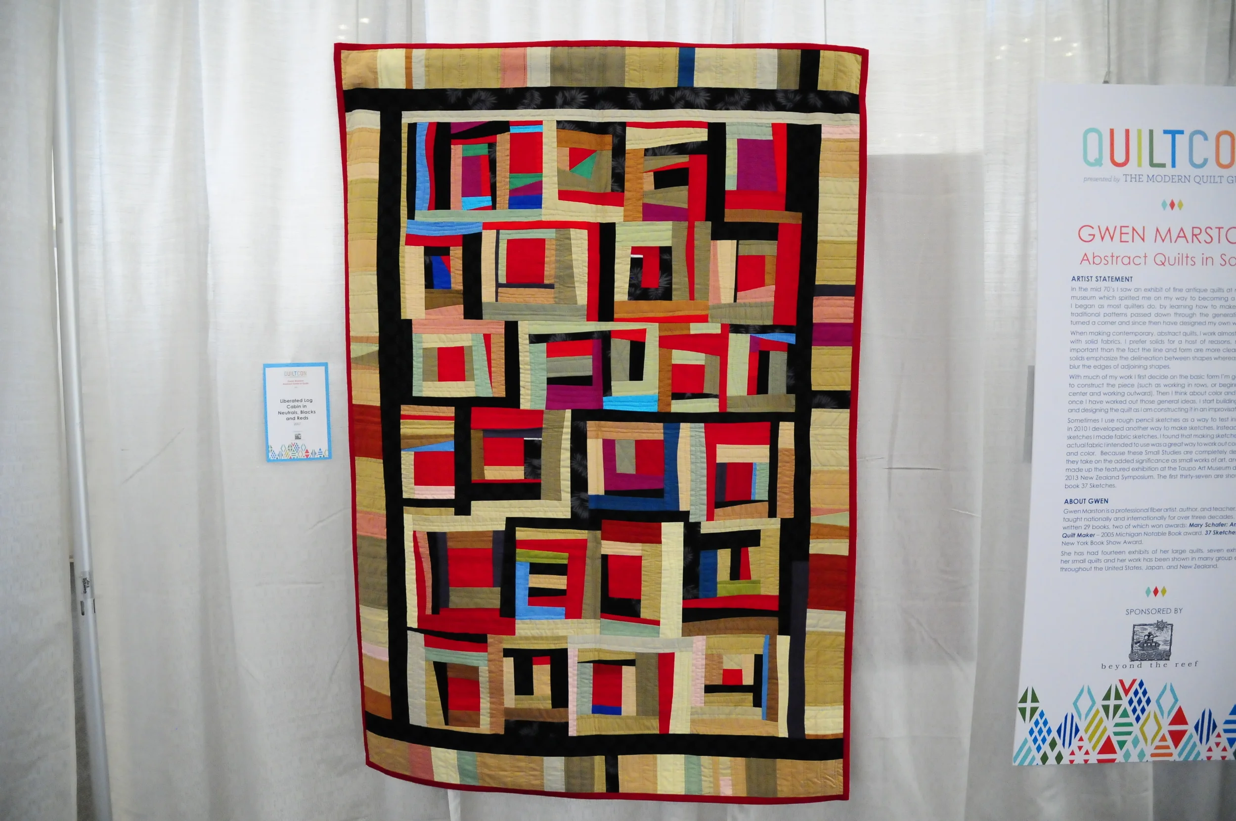 Liberated Log Cabin in Neutrals, Blacks and Reds by Gwen Marston