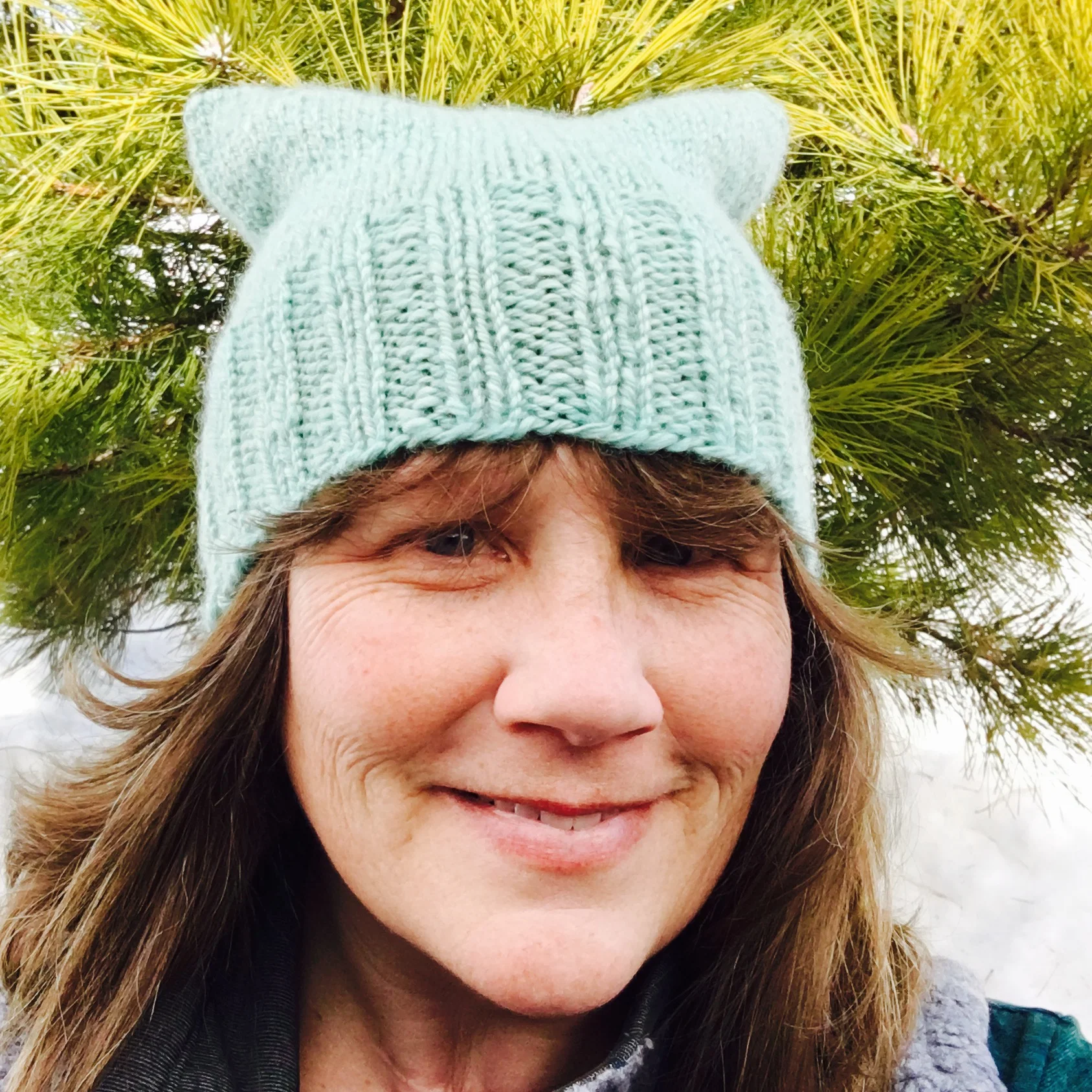 Turquoise pussyhat for sale.