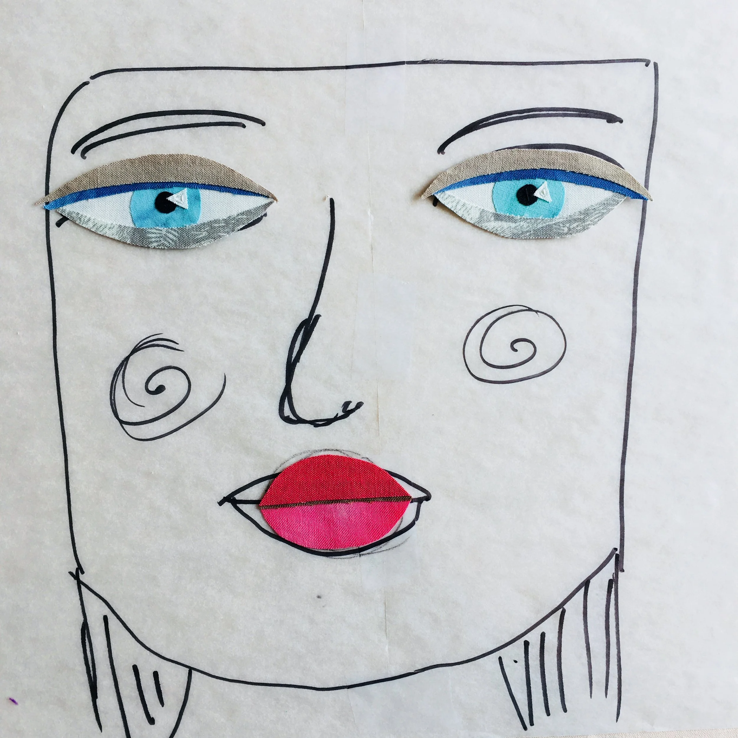 Once the eyes are complete they are fused, then I can decide on other features. The lips have a dark fabric placed under the upper lip for definition between the upper and lower. Melissa also recommends having the upper lip a shade darker than the lower lip.