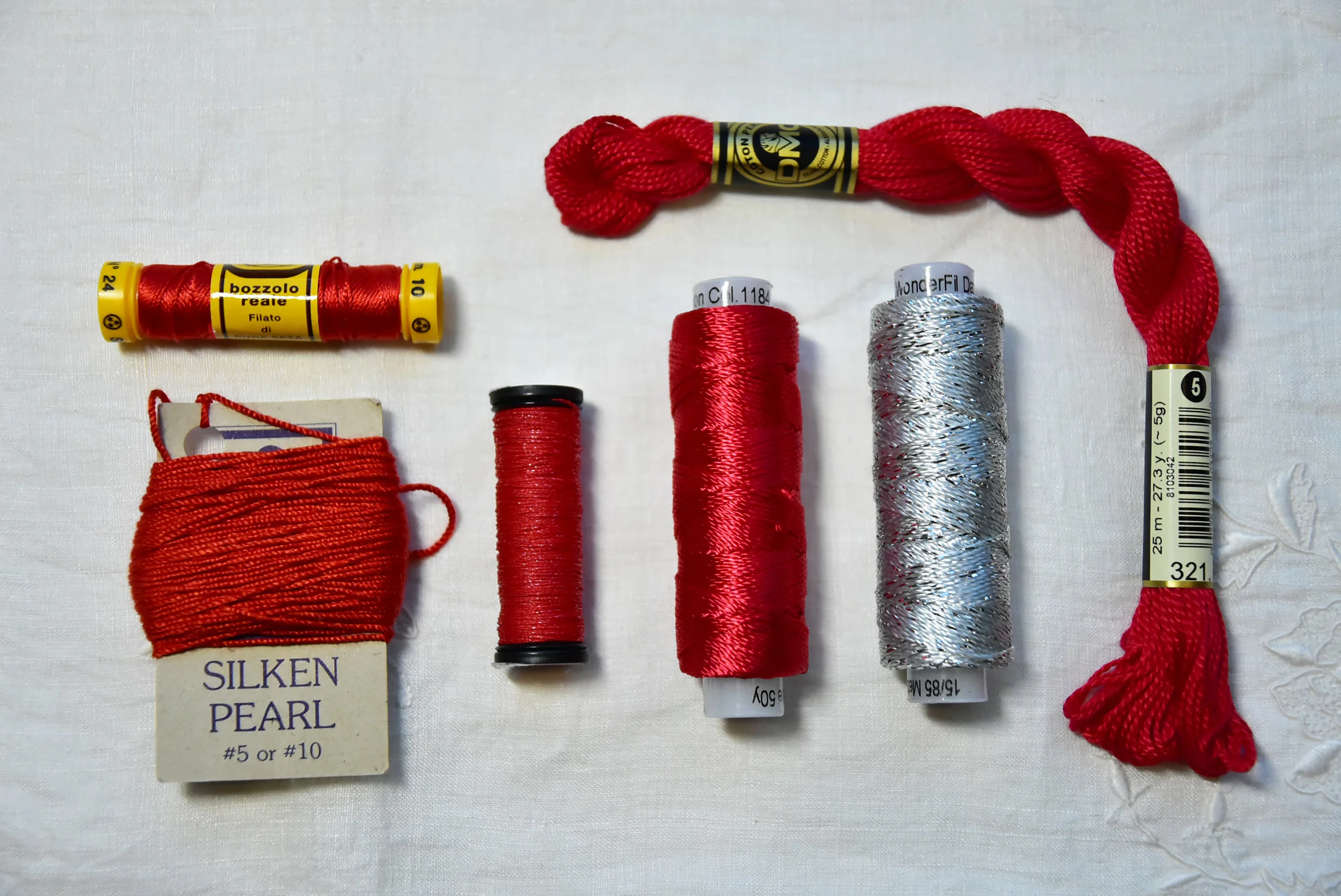 Pretty, but not for me: Bozzolo Reale silk thread, Silken Pearl, Kreinik metallic braid, WonderFil Razzle, WonderFil Dazzle, DMC perle cotton (5).