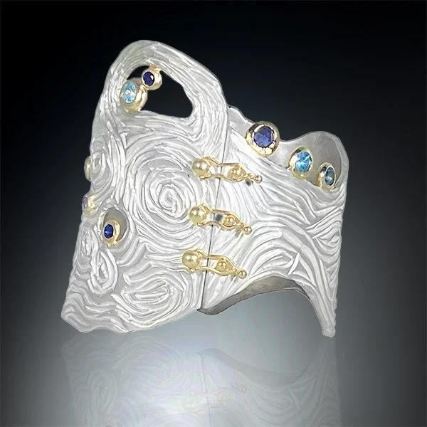 Orbital asymetric cuff web.jpg