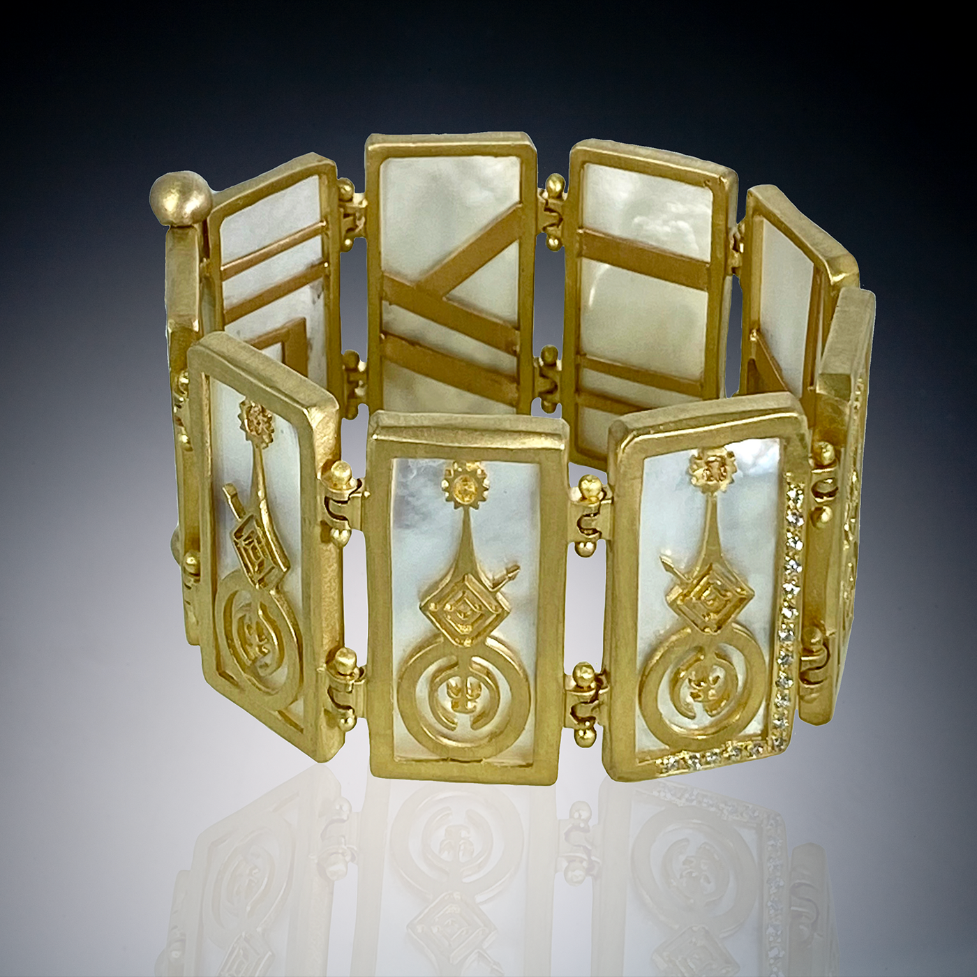 geocentric bracelet gold web.png