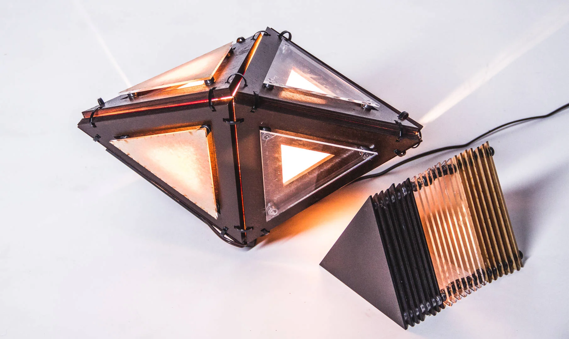 The Mod Box is a modular light box that features different panels onto which different light modifiers may be attached to. With different panel options, users can control and manipulate the amount of light that comes out. If the user wishes to prevent light from coming out of the back of the light, they can simply attach opaque panels on the back and transparent panels on the front.