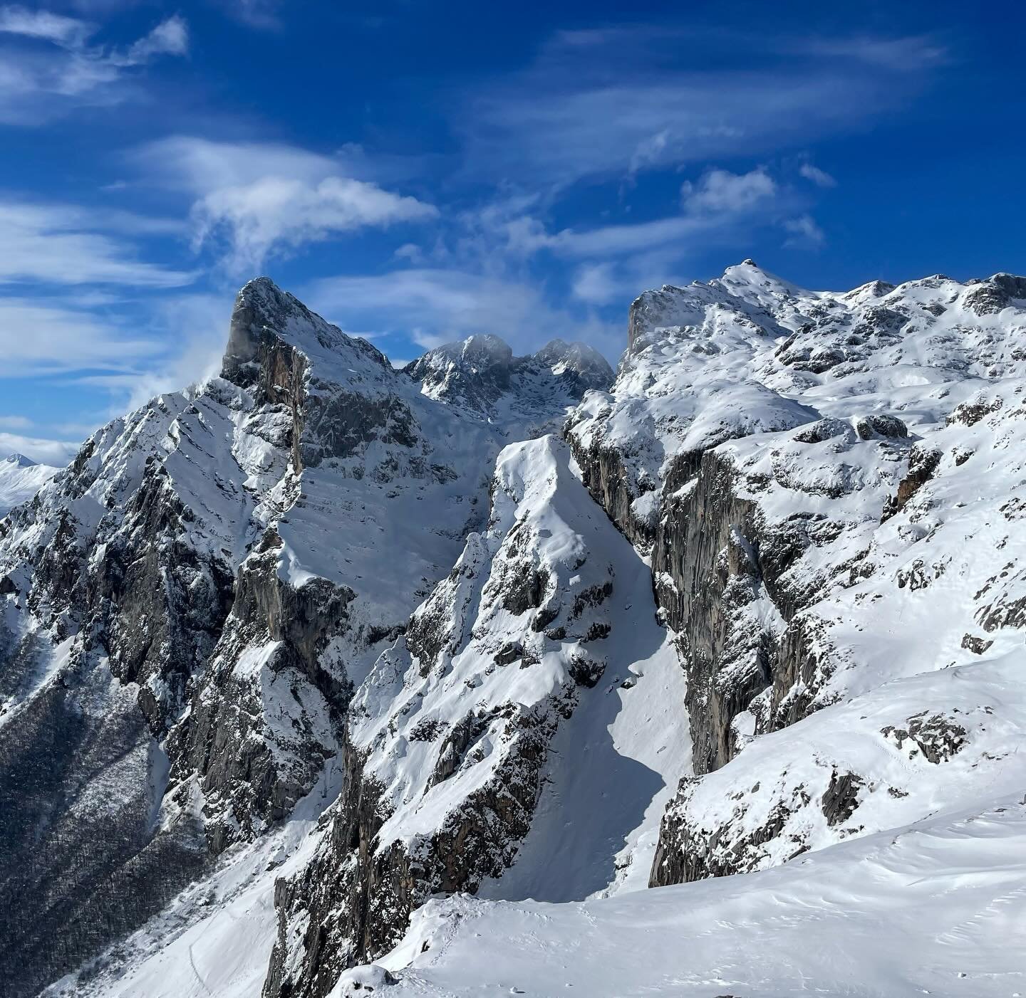 Alps? No, Northern Spain, the rugged alpine side of things.  Jagged limestone peaks, lots of deep snow and beautiful on a sunny day like this one, unforgiving in a storm.  #NorthernSpain #mountains #mountainscape #customtours #privatetour