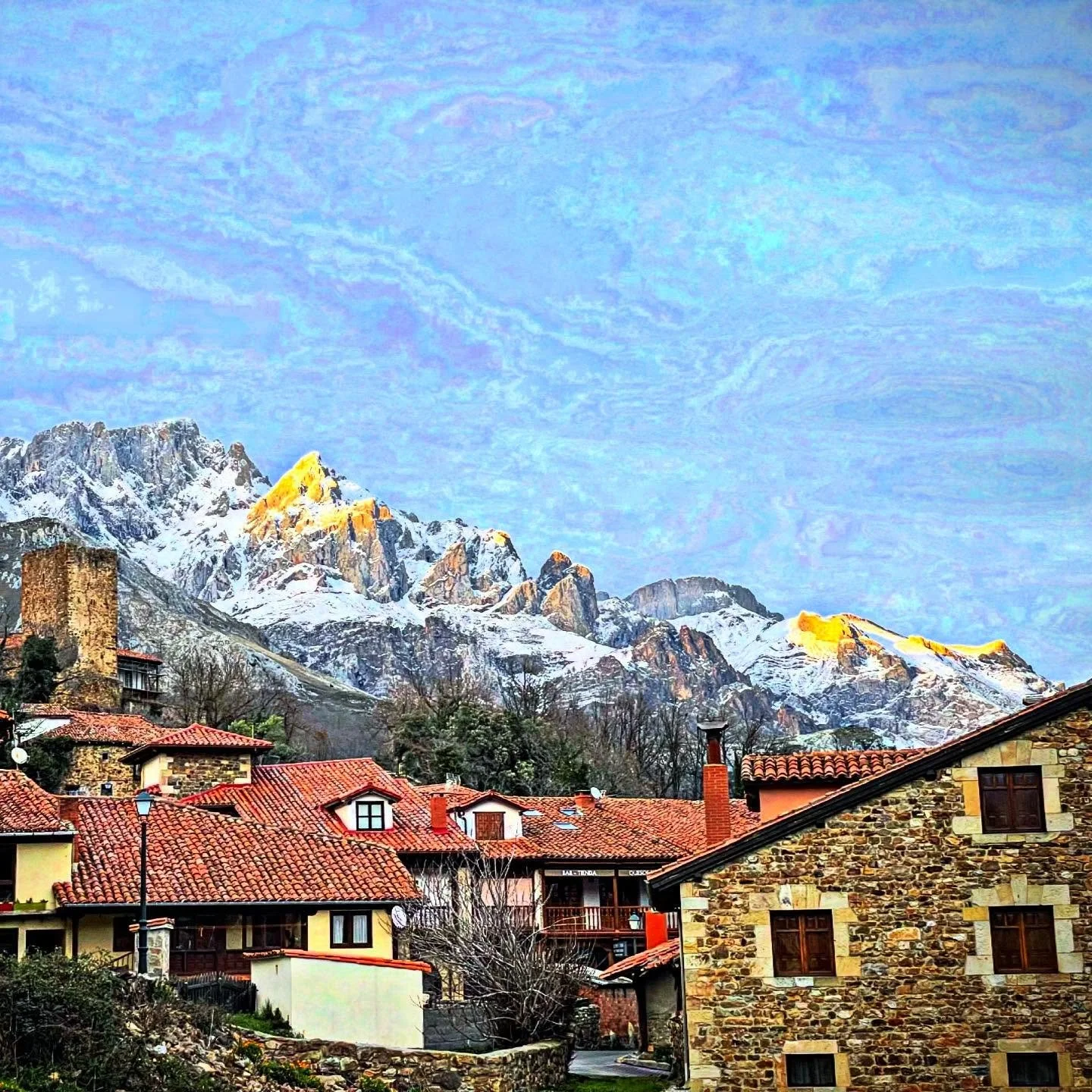 Van Gogh Sky Lights.  Not big on lots of filters but when I played around I got a &ldquo;Starry Night&rdquo; look out of these sunlit peaks.  Beautiful I thought. Enjoy! #NorthernSpain #mountains #mountainscape #phototour #customtours